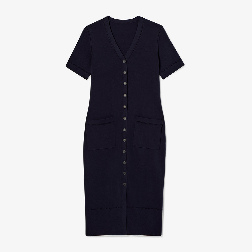 Black dress with short sleeves and buttons on a white background