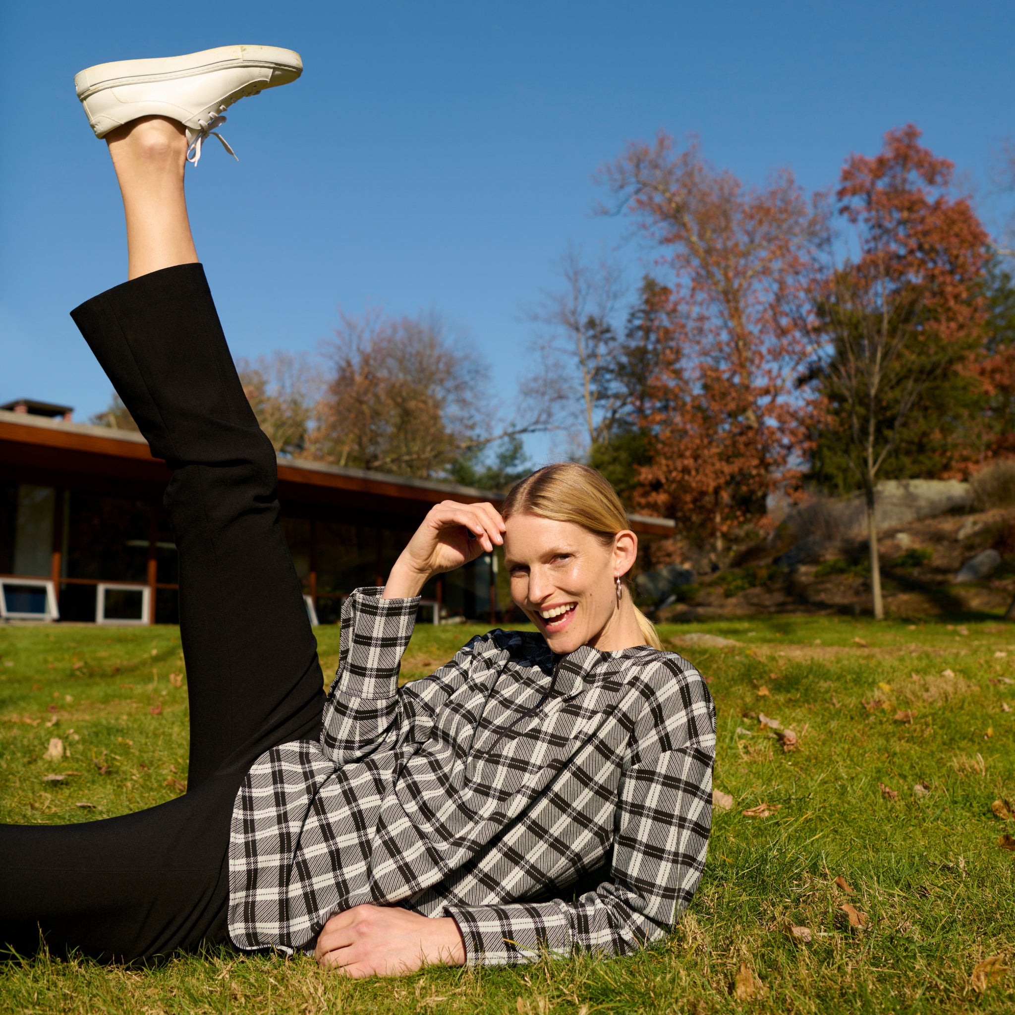 image of a woman wearing the kick flare foster pant