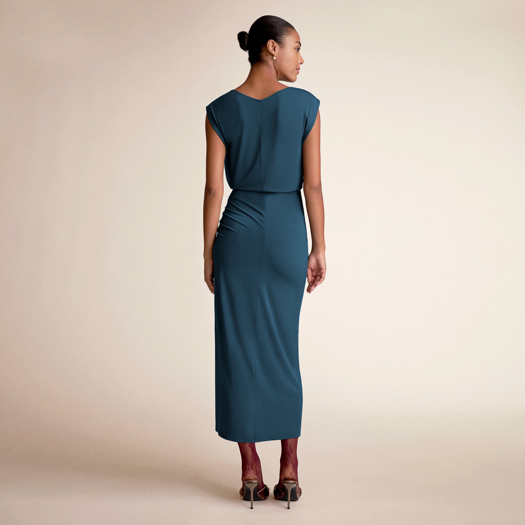 Woman wearing zita dress in moroccan blue