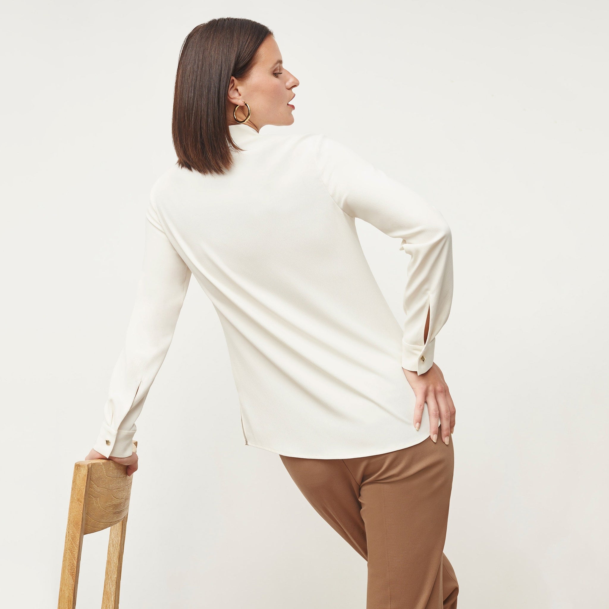 Back image of a woman standing wearing the Lagarde Shirt—Soft Wave in Alabaster