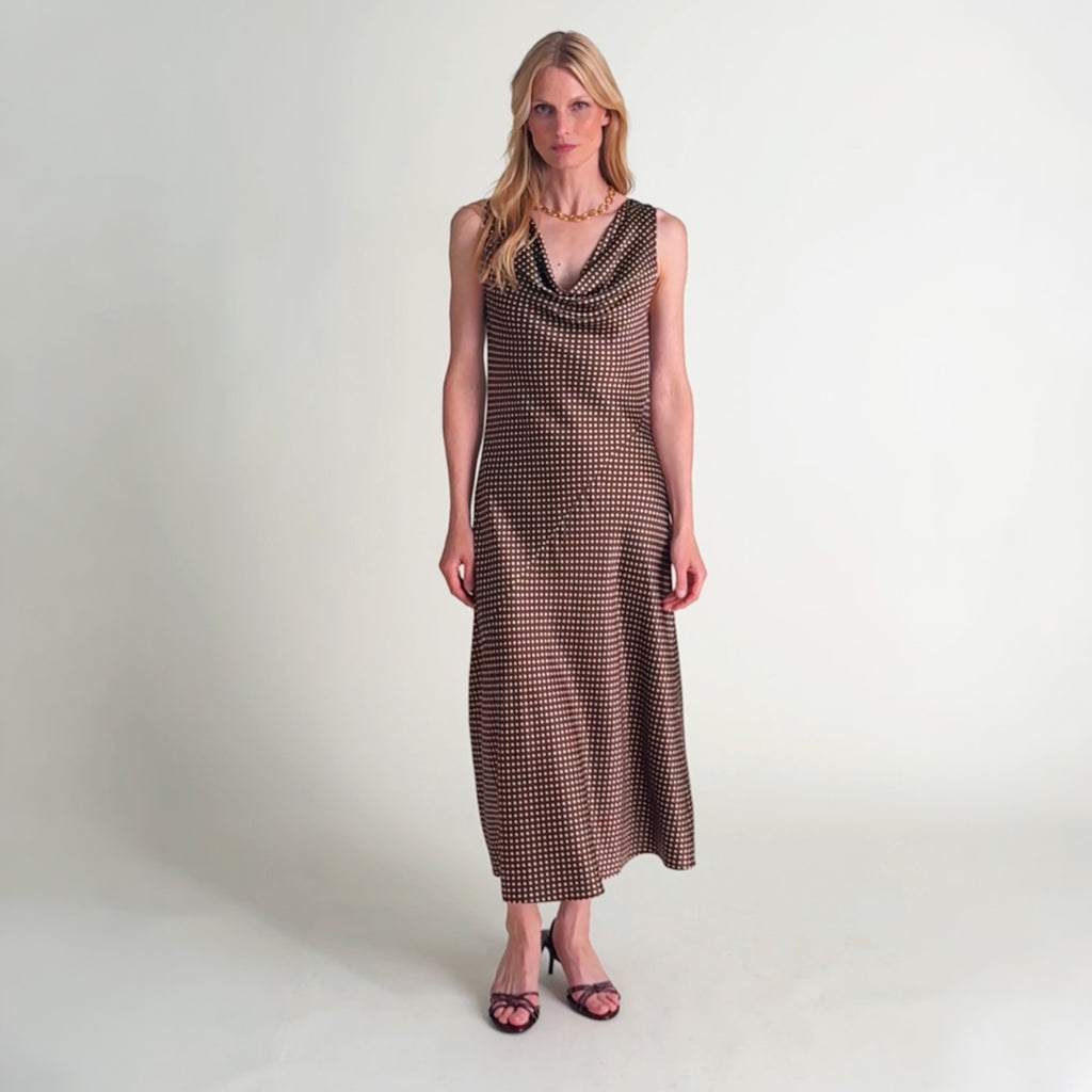 Woman wearing the priya dress in dot print