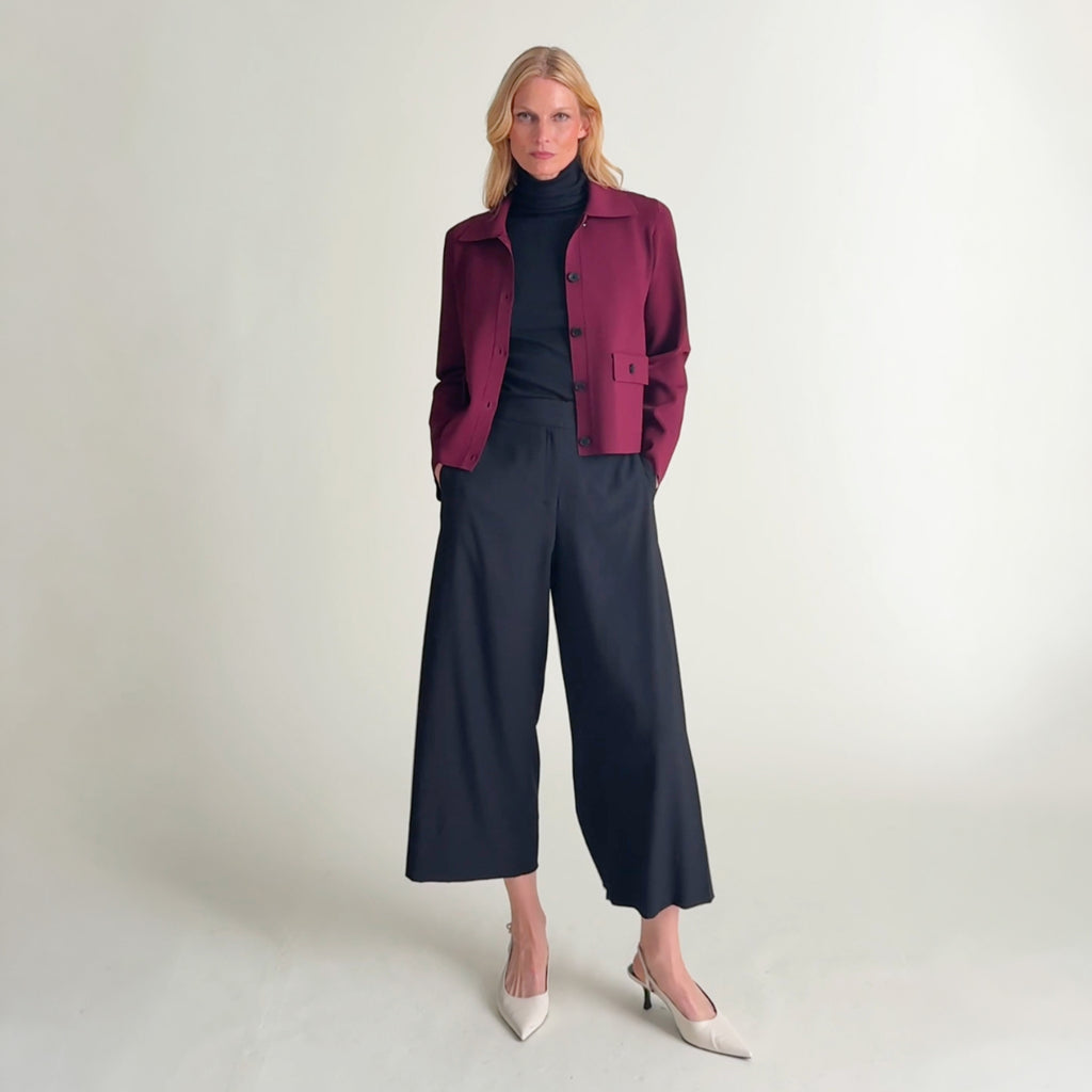 Woman wearing the maribel jardigan in port wine with the zhou culotte in black