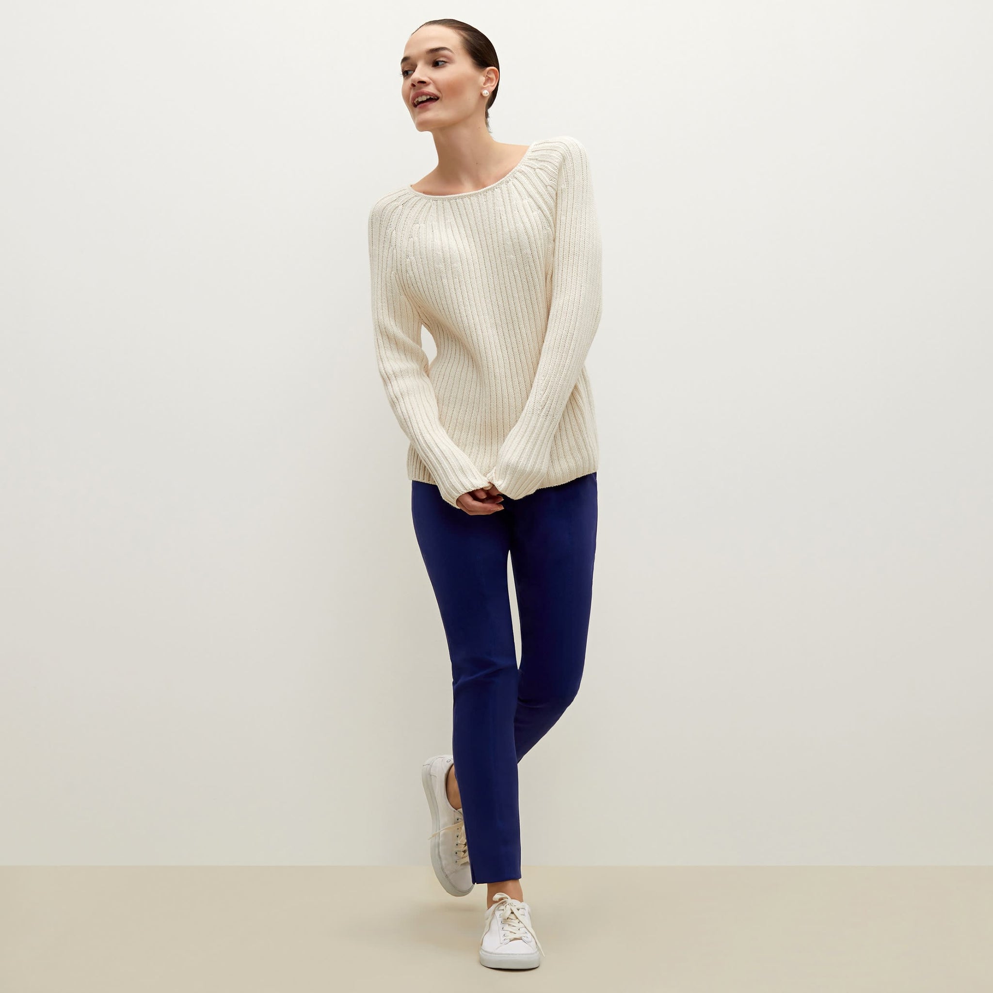 Front image of a woman standing wearing the Marais pant in starry night 