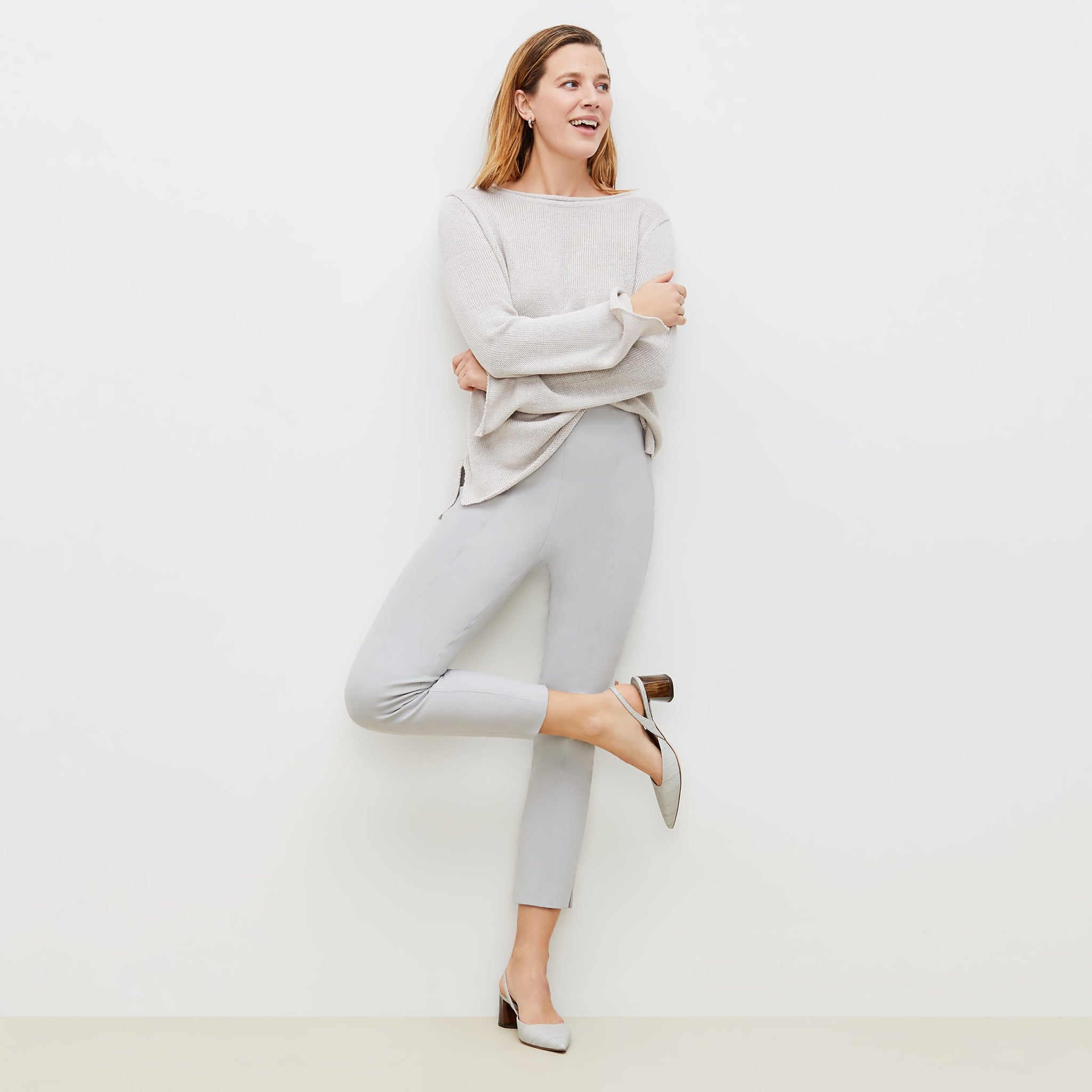 Front image of a woman standing wearing the marais pant in quartz