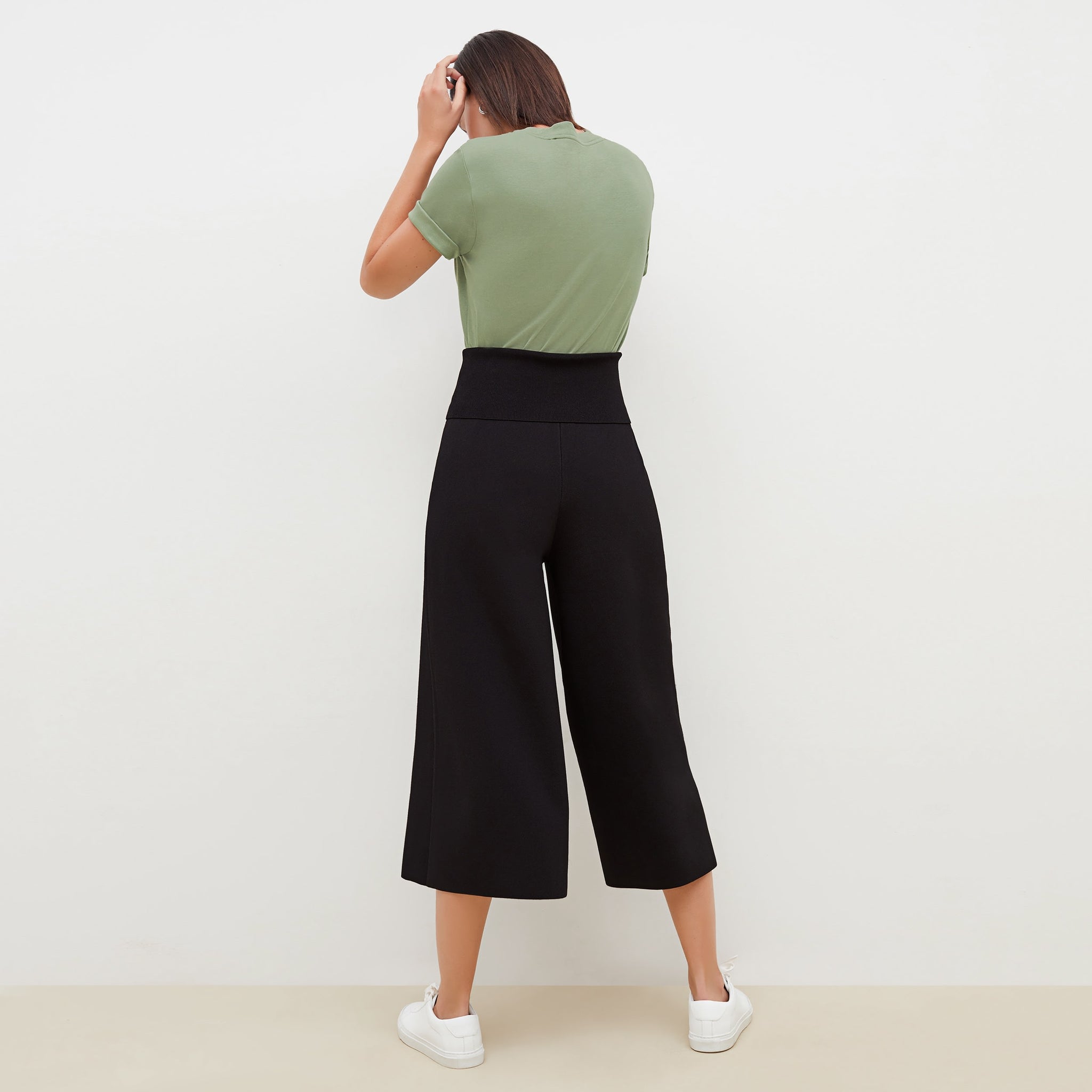 Back image of a woman standing wearing the Rogala Pant—Jardigan Knit in Black