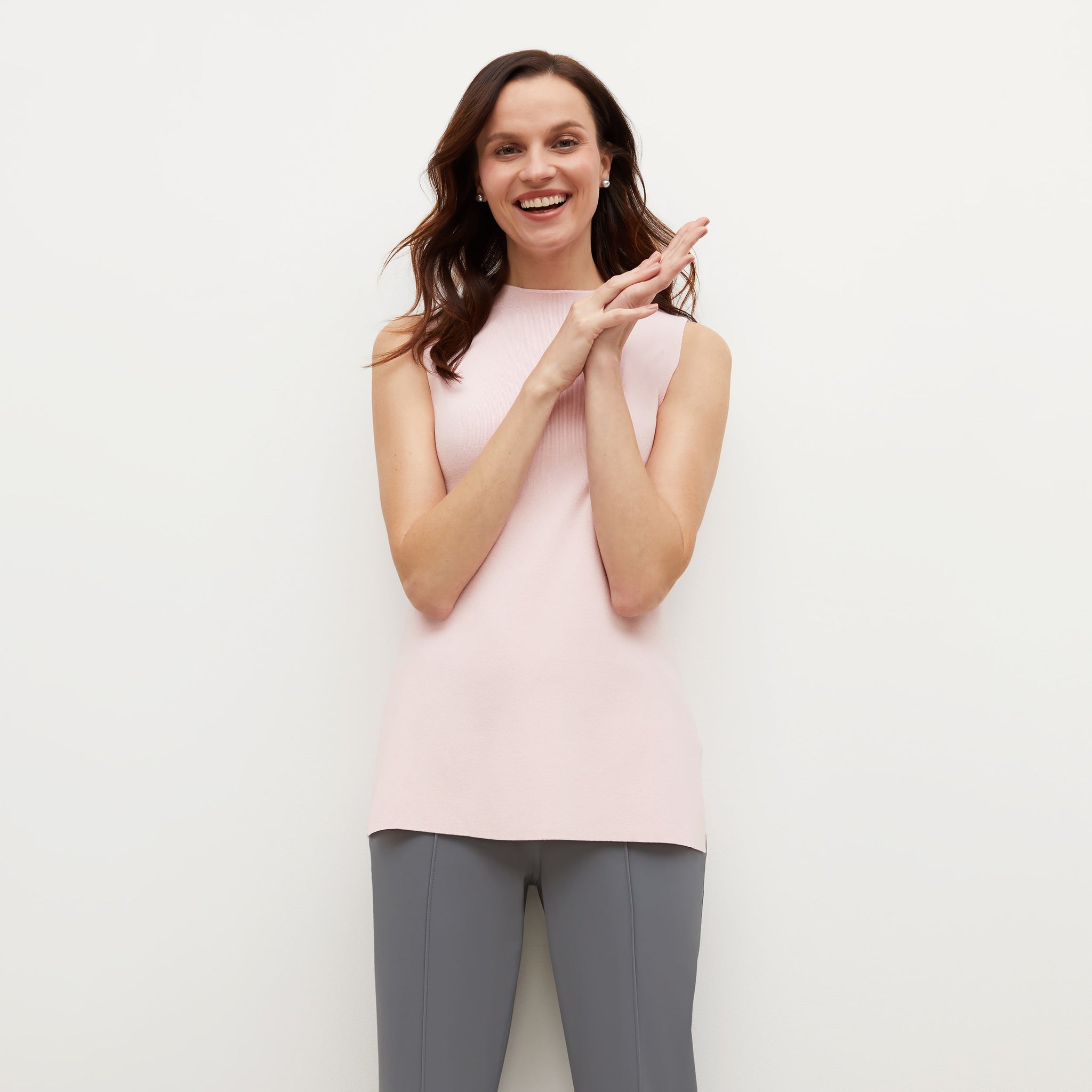 Front image of a woman standing wearing the Giulia Top—365Knit in Rosewater 