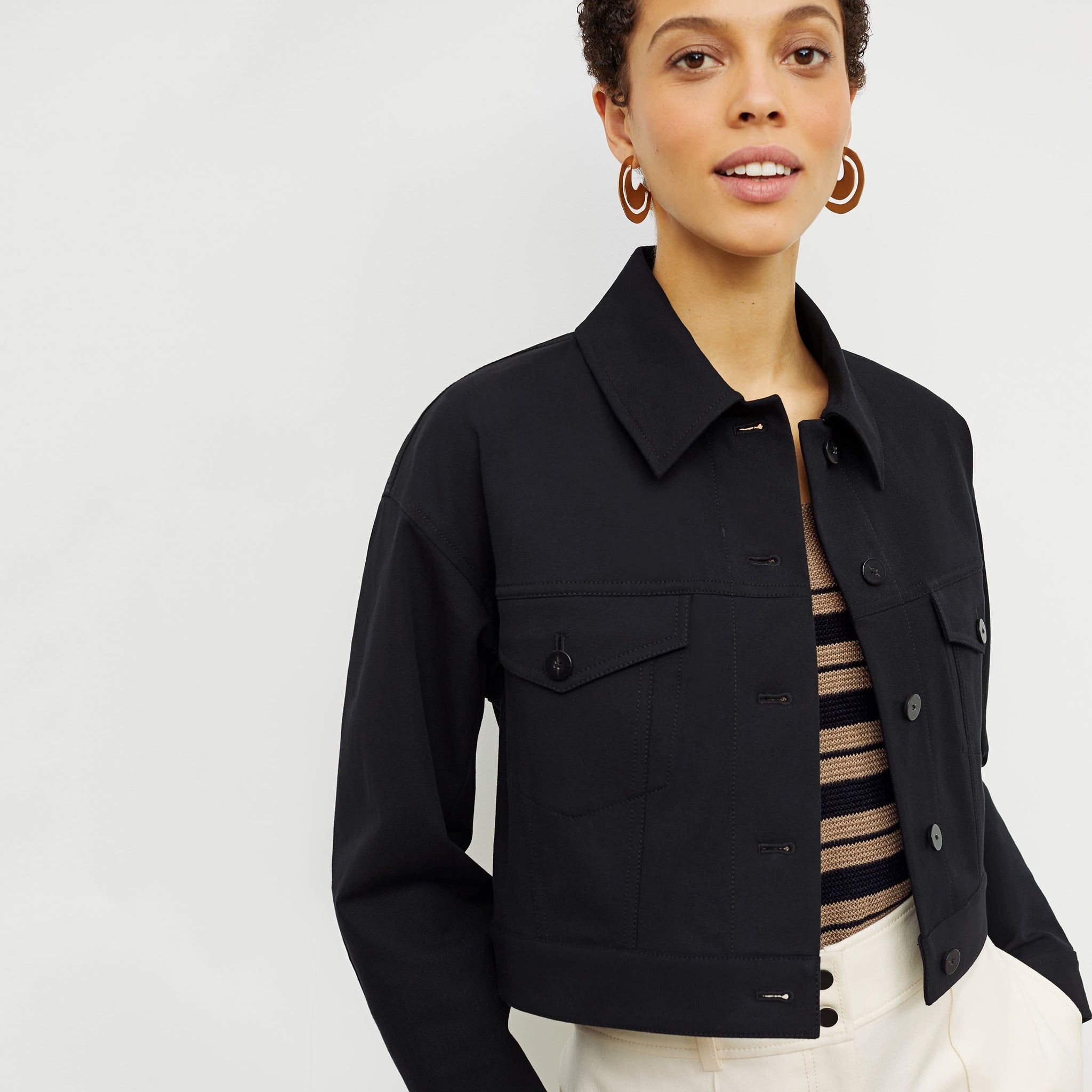 Front image of a woman standing wearing the Anna Jacket—Better Than Denim in Black