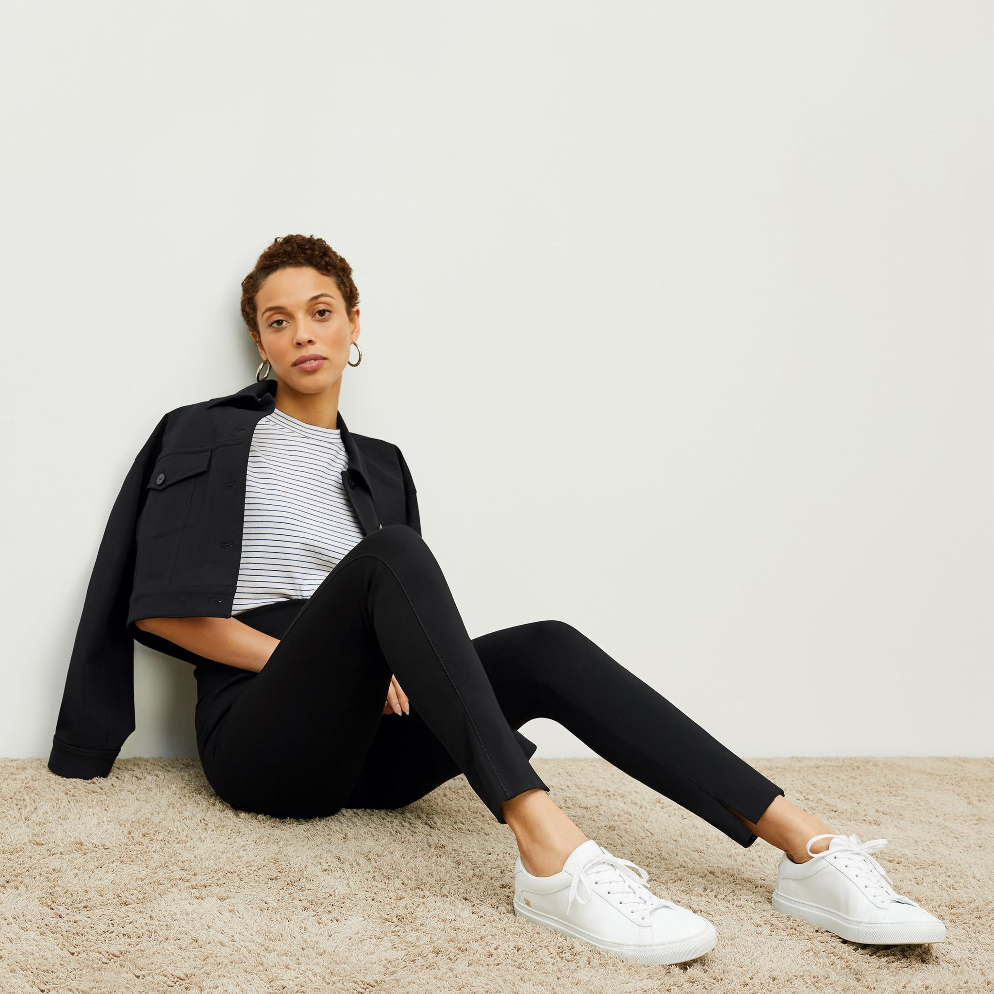 image of woman wearing M.M.LaFleur x Koio Capri Low-Top Sneakers—Leather White