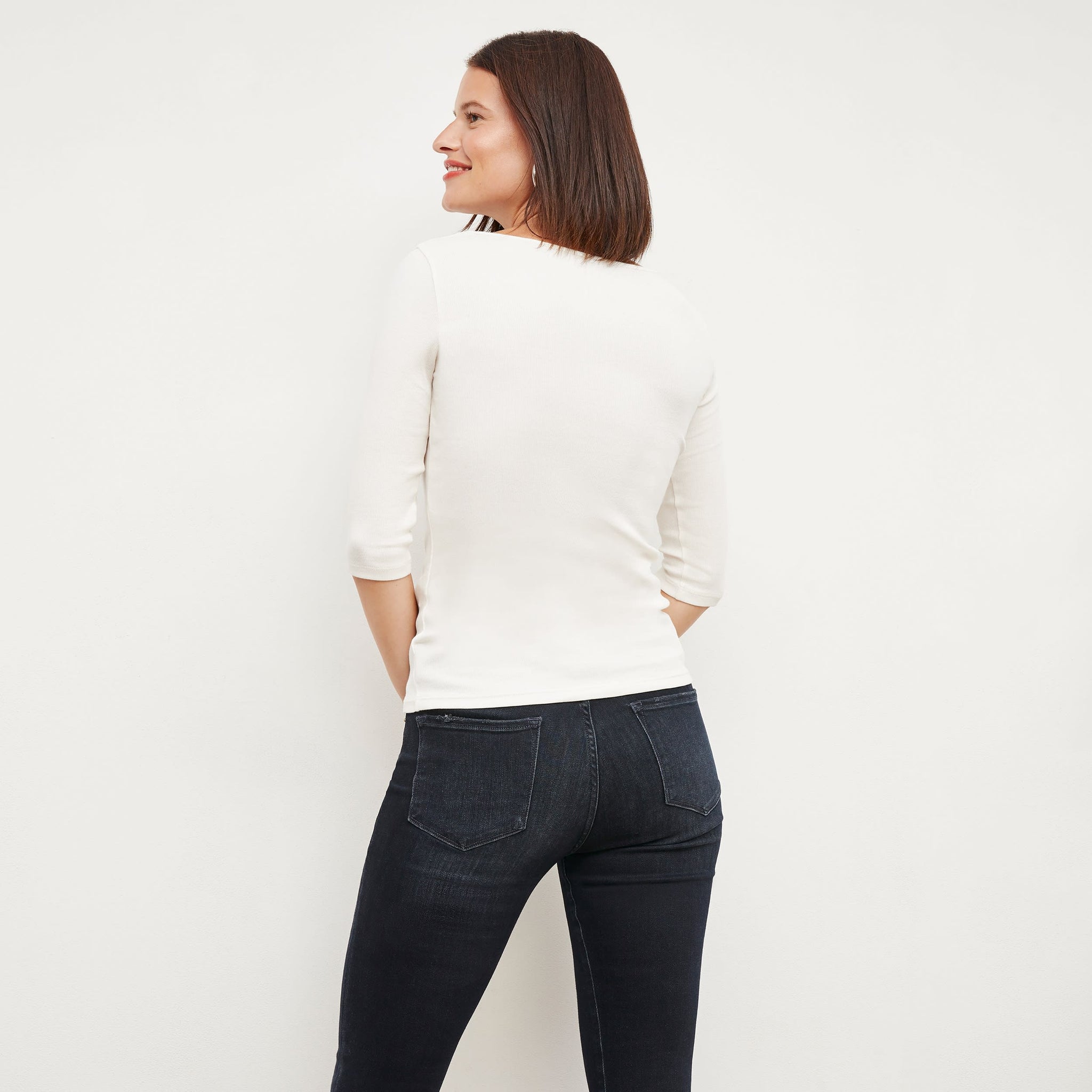 Back image of a woman wearing the Soyoung top in Ivory