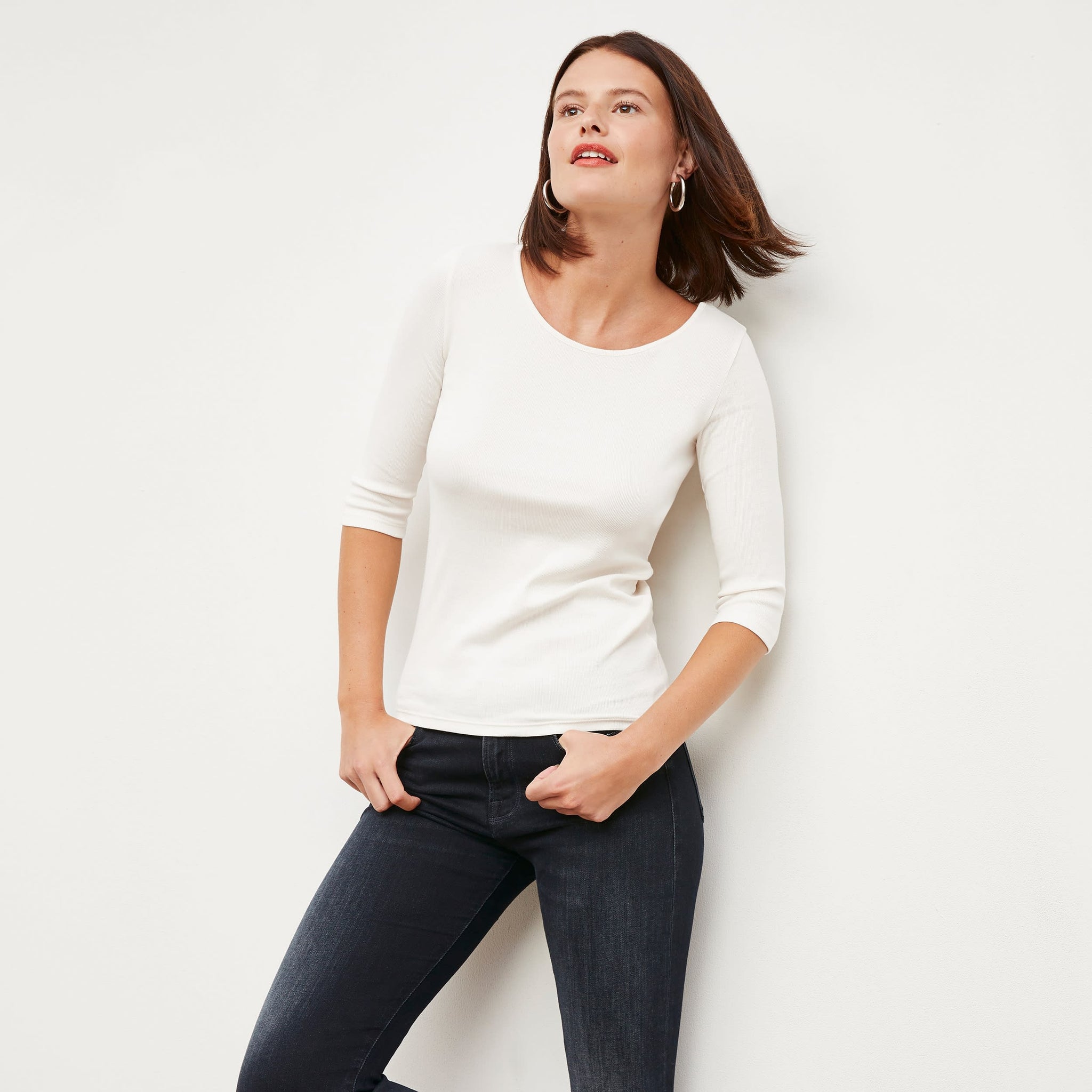 Front image of a woman wearing the Soyoung top in Ivory