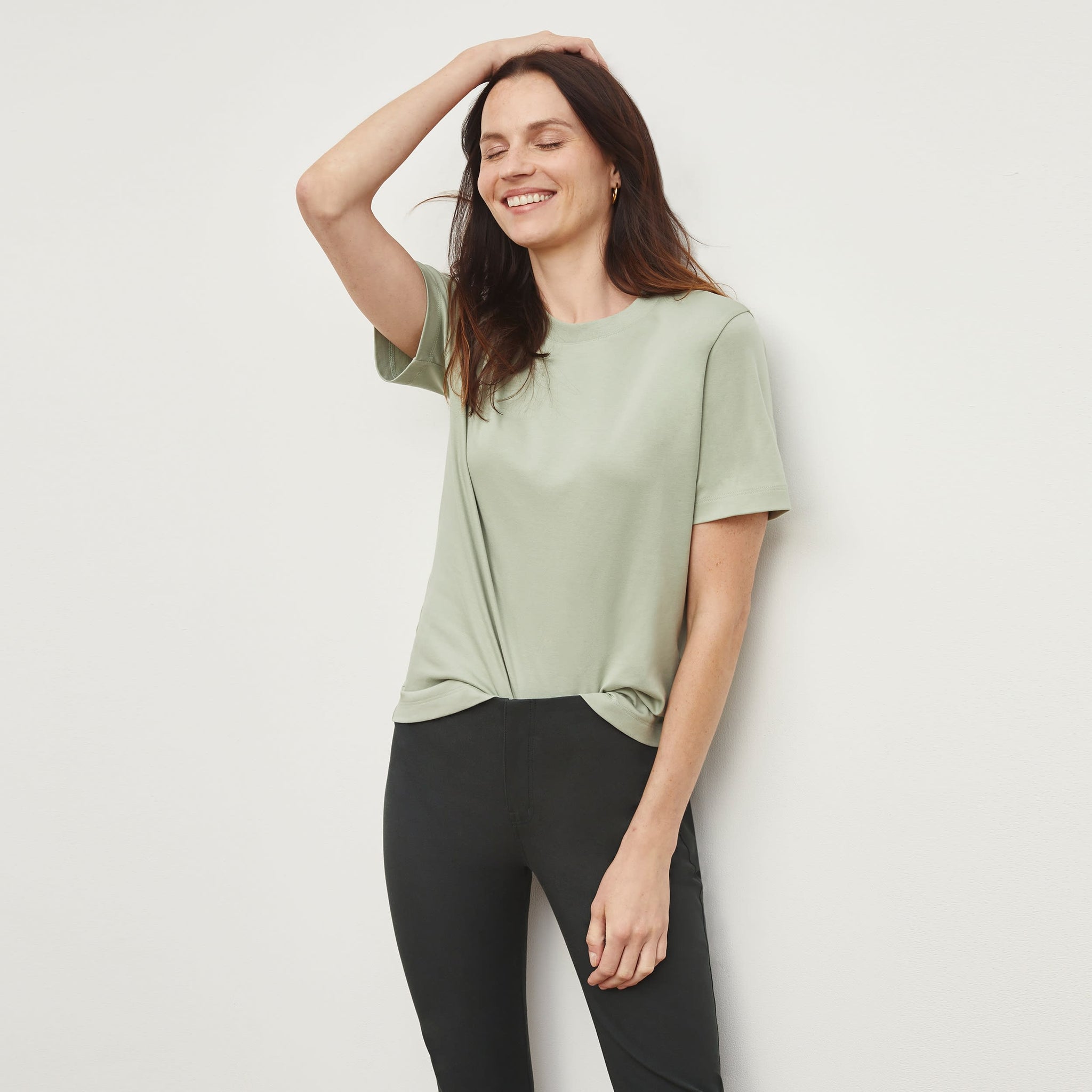 woman wearing the leslie t in minty green 