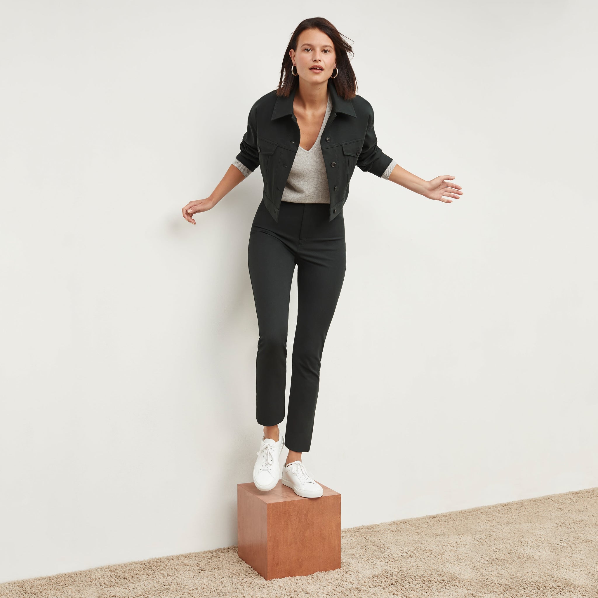 Front image of a woman standing wearing the Hockley Jean in Hemlock