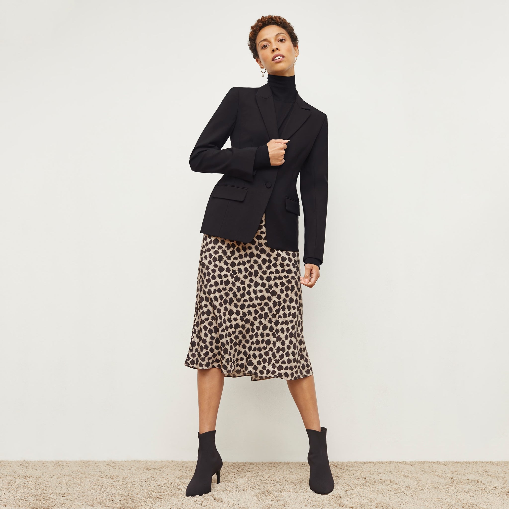 Front image of a woman wearing the orchard skirt in sahara print
