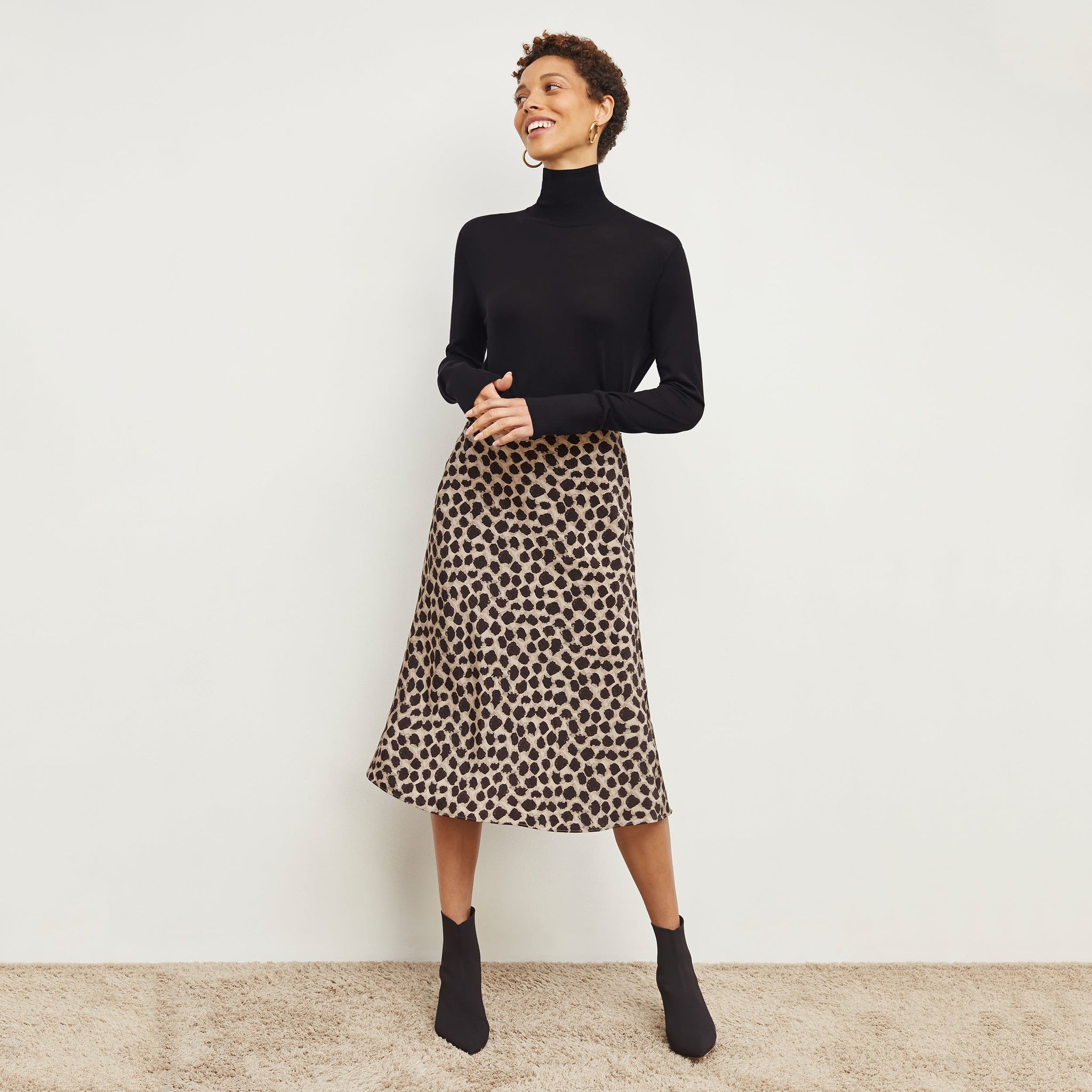 Front image of a woman wearing the orchard skirt in sahara print 