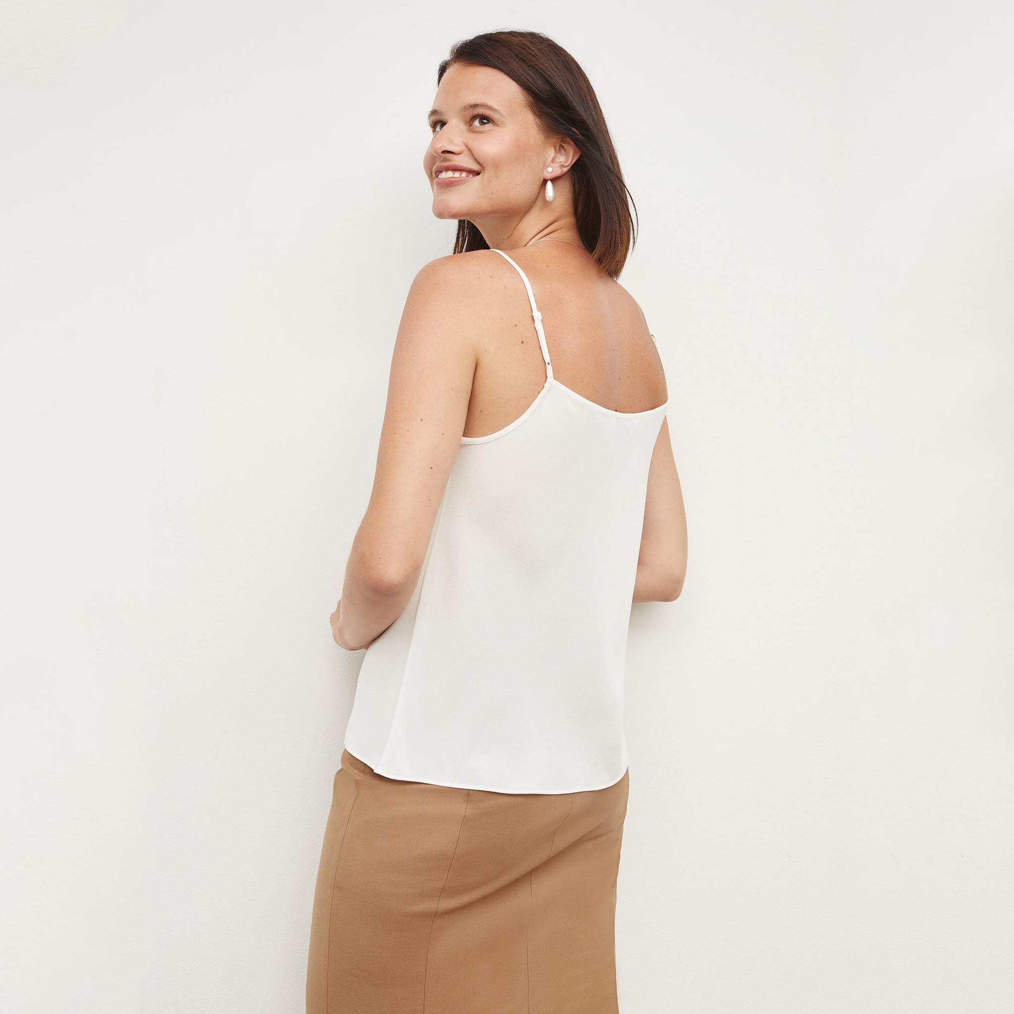 back image of a woman wearing the Lisey cami in ivory