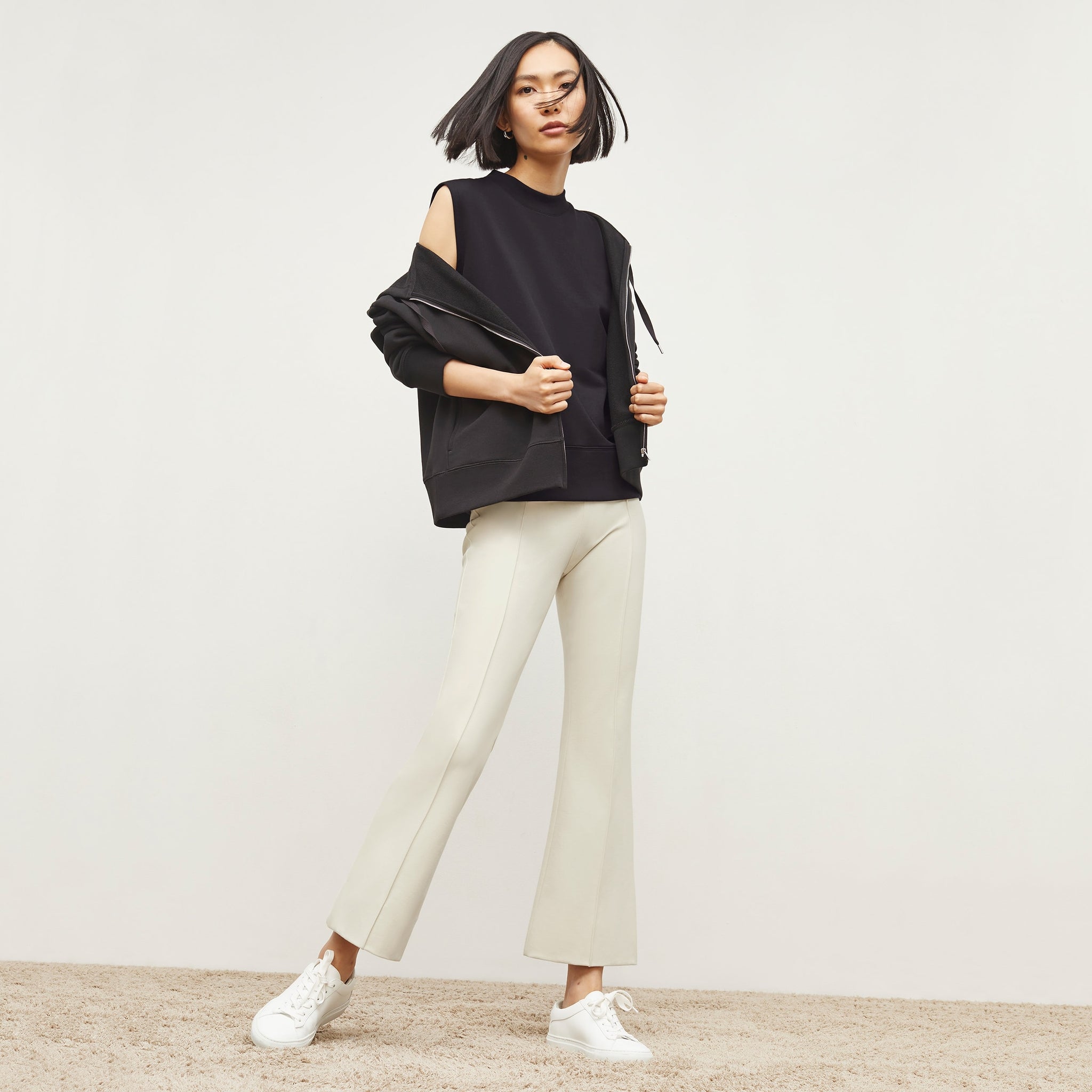 Front image of a woman standing wearing the Shiloh Pant in Pearl