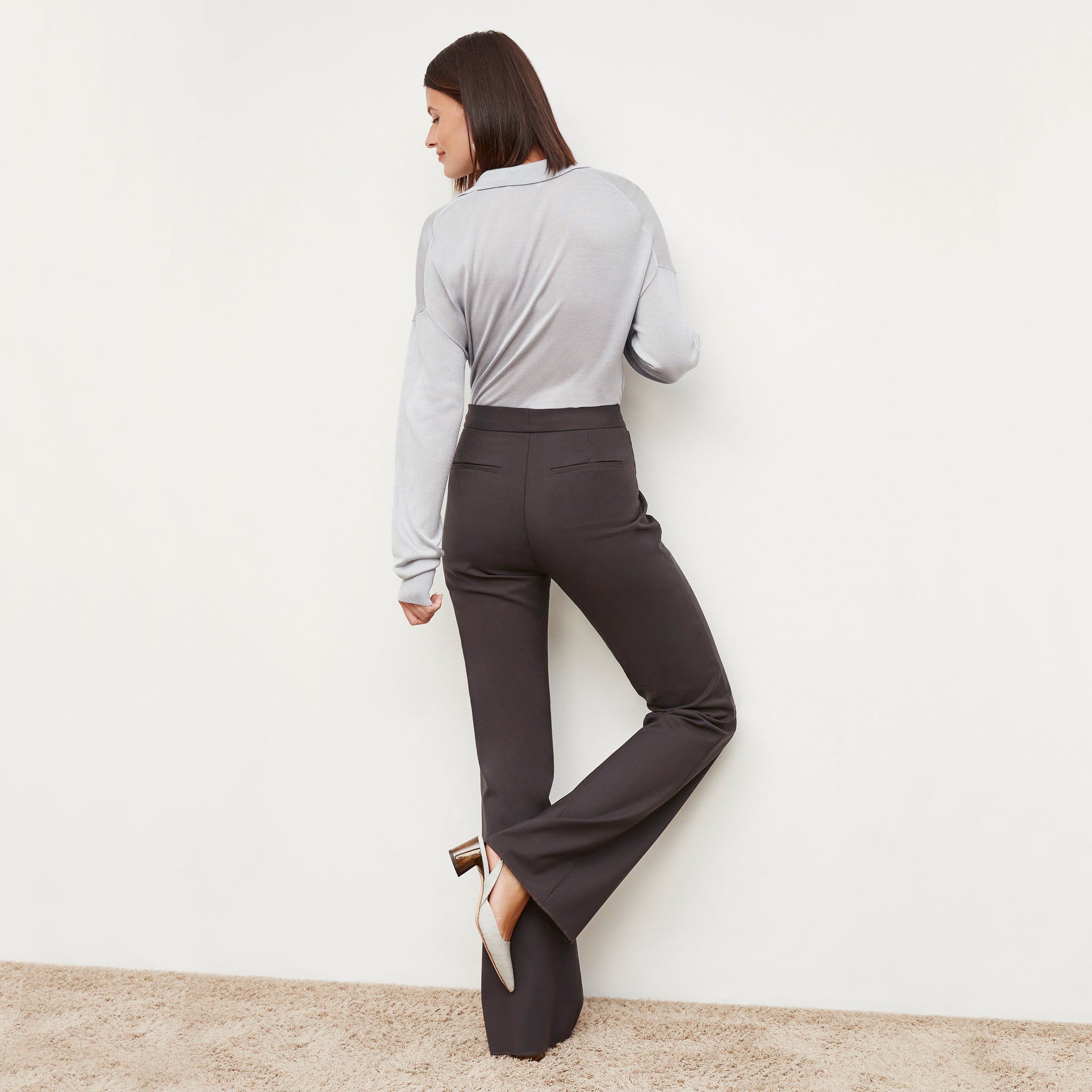Front image of a woman standing wearing the Horton Pant in Haze