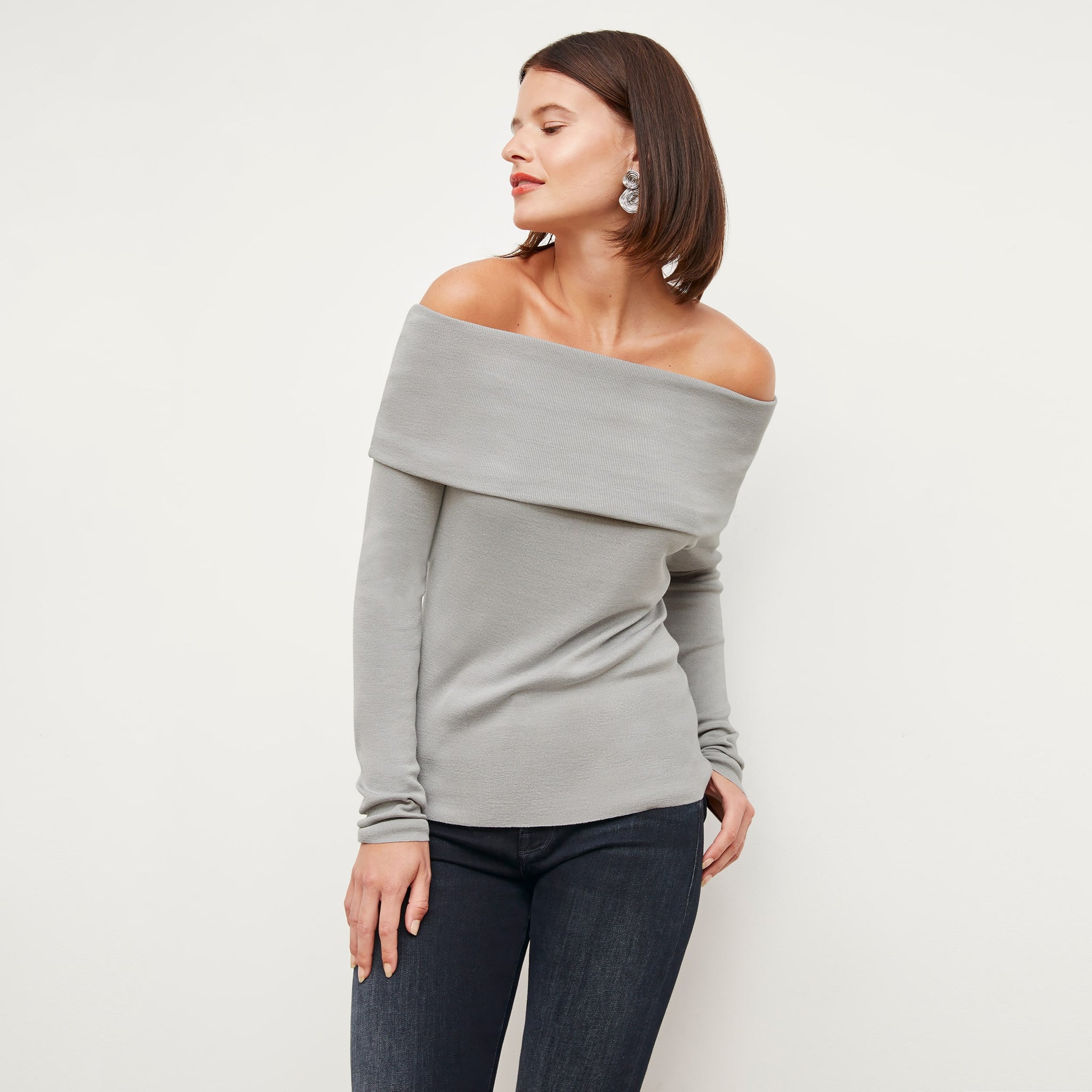 Front image of a woman wearing the Dae Top in Pale Gray 