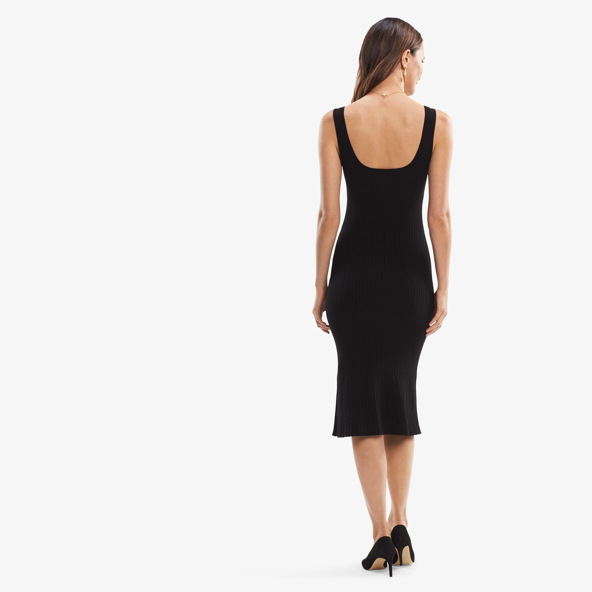 Back image of a woman standing wearing the Gwen Dress in Black