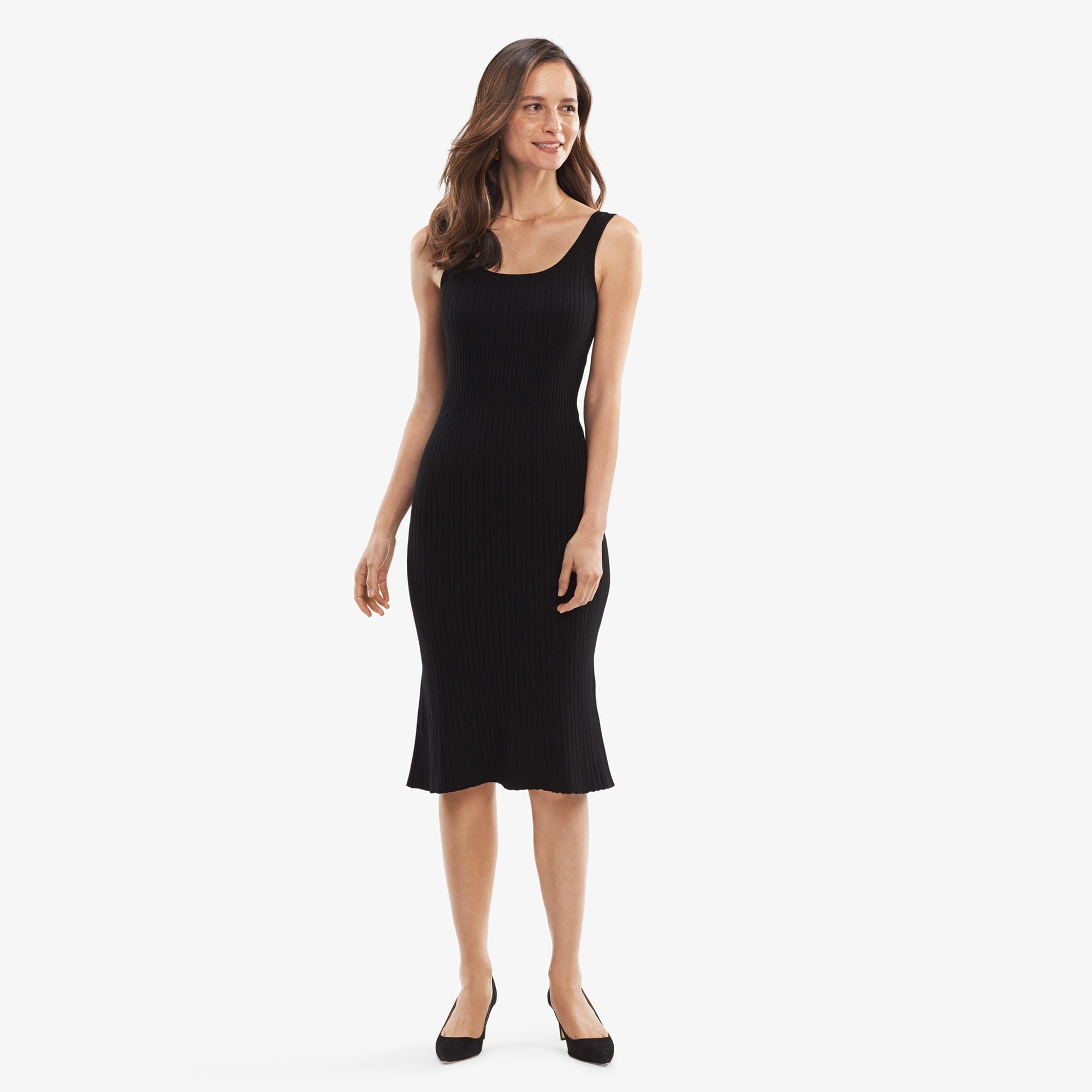 Front image of a woman standing wearing the Gwen Dress in Black