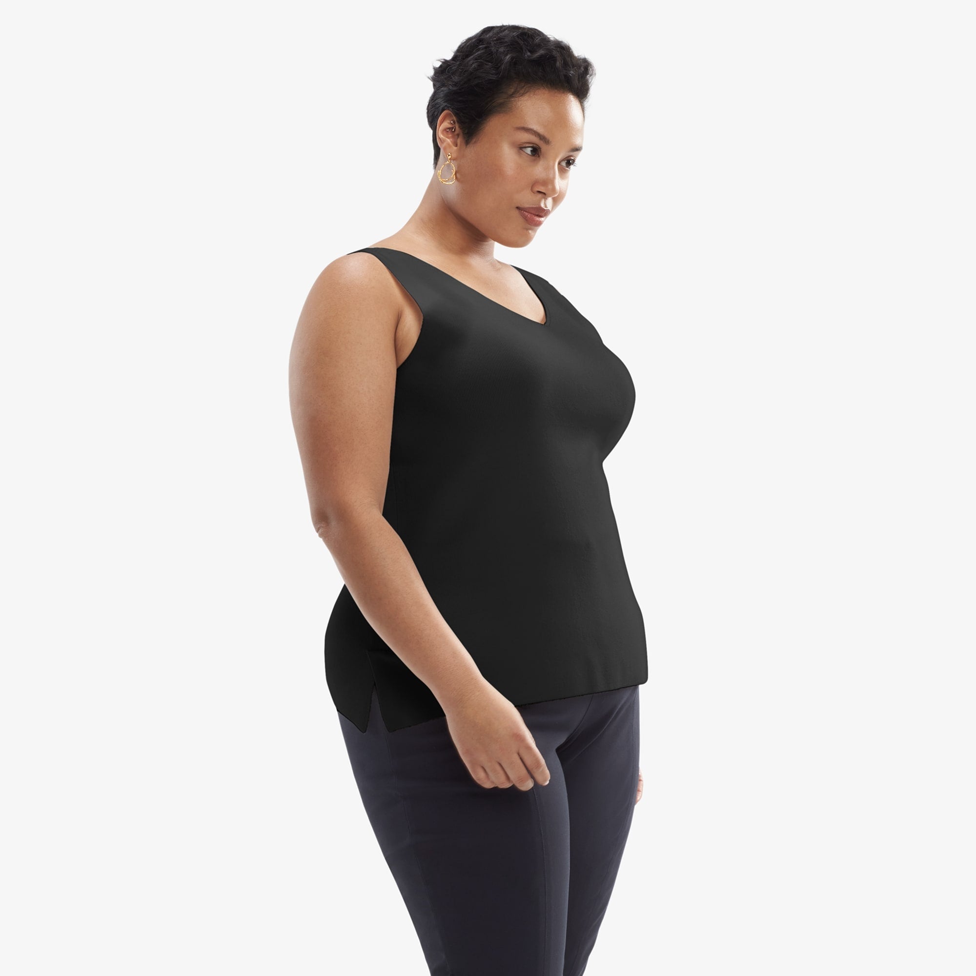 Side image of a woman wearing the Peggy top in Black