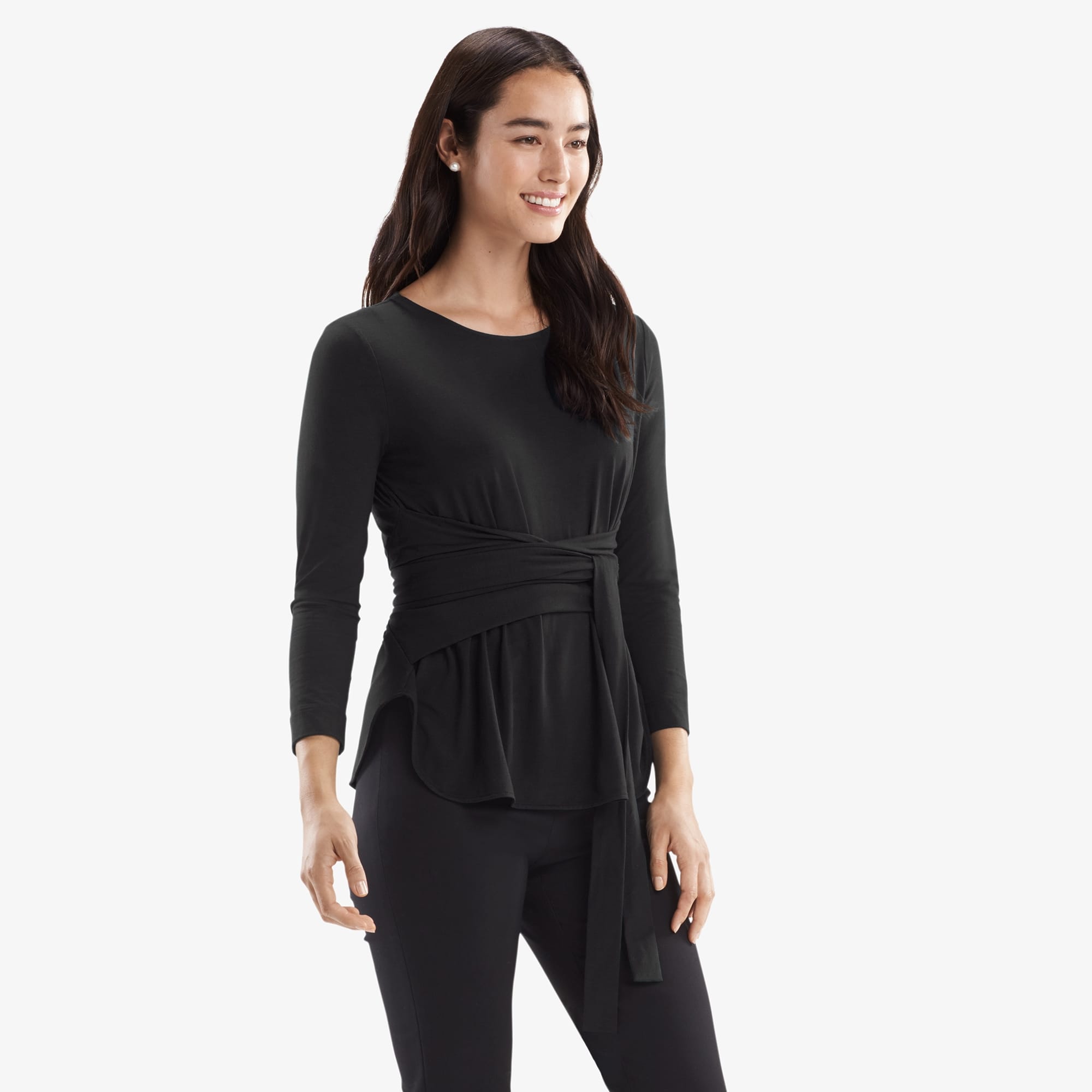 Side image of a woman standing wearing the Walker top knit crepe in Black