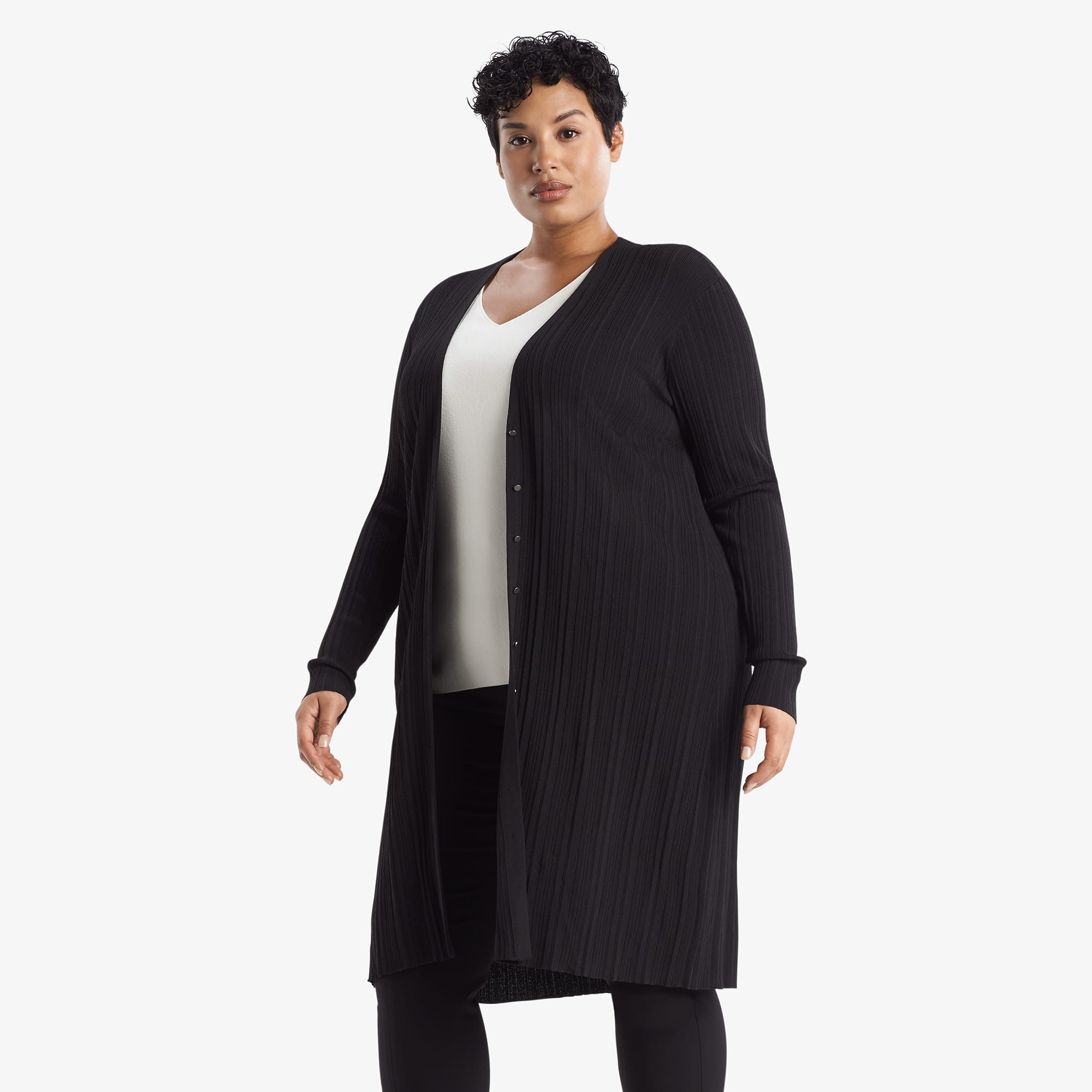 Side image of a woman wearing the Molly Cardigan - Textured Knit in Black