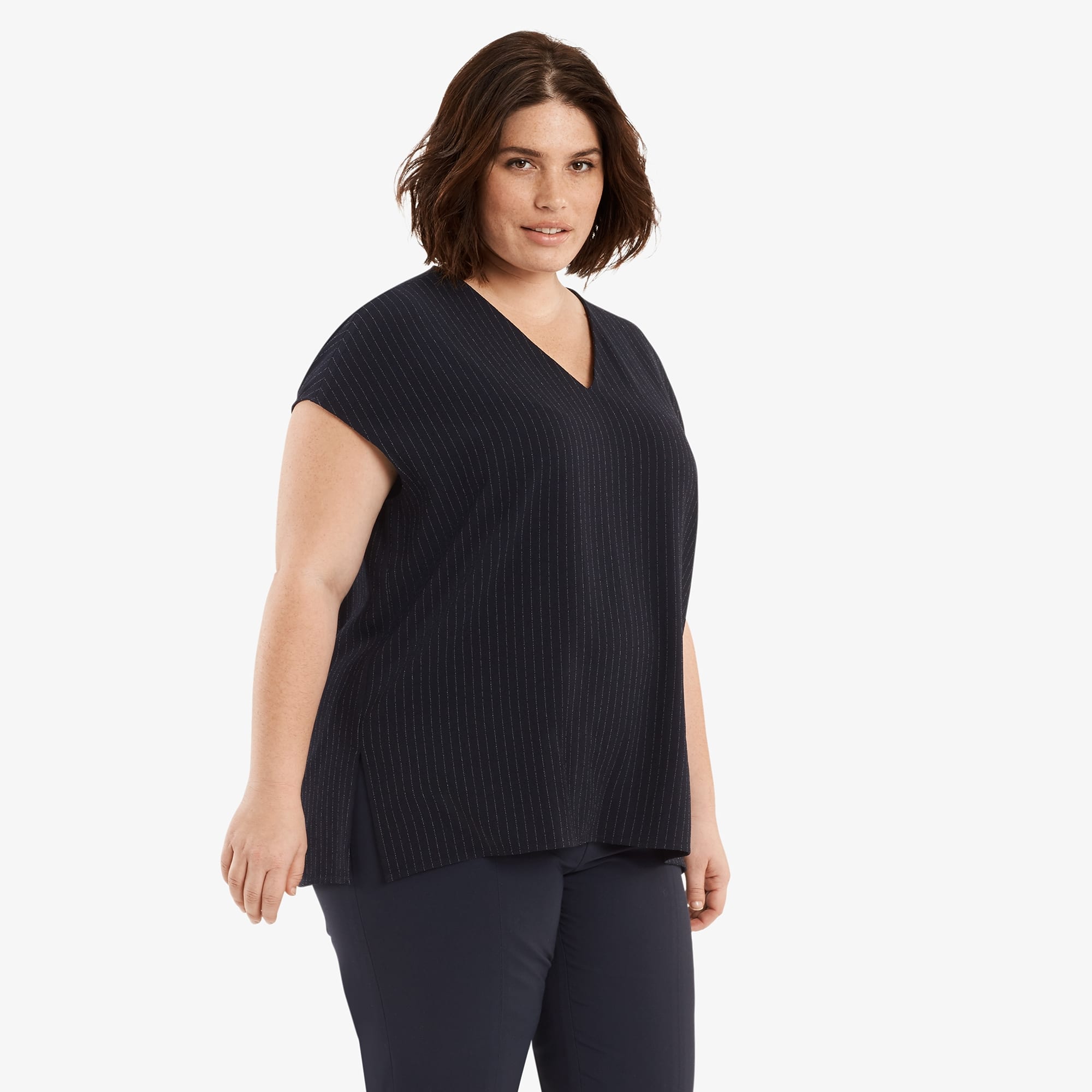 Side image of a woman standing wearing the Townsend Top in navy/white