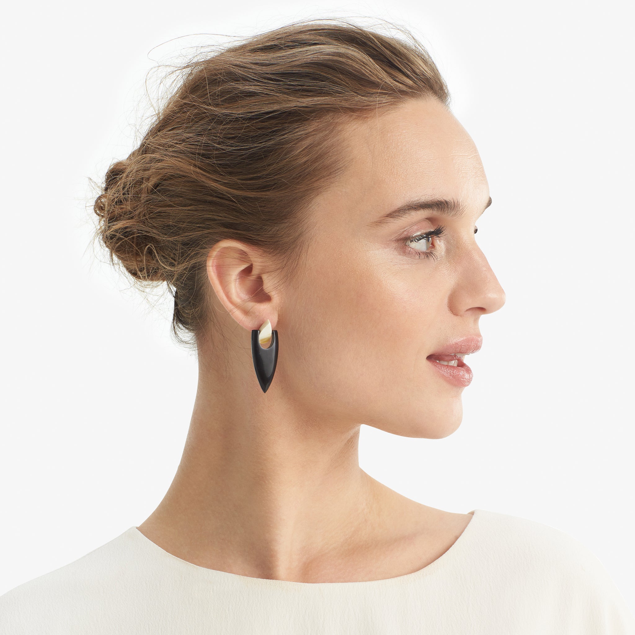 image of a woman wearing the mildred earrings