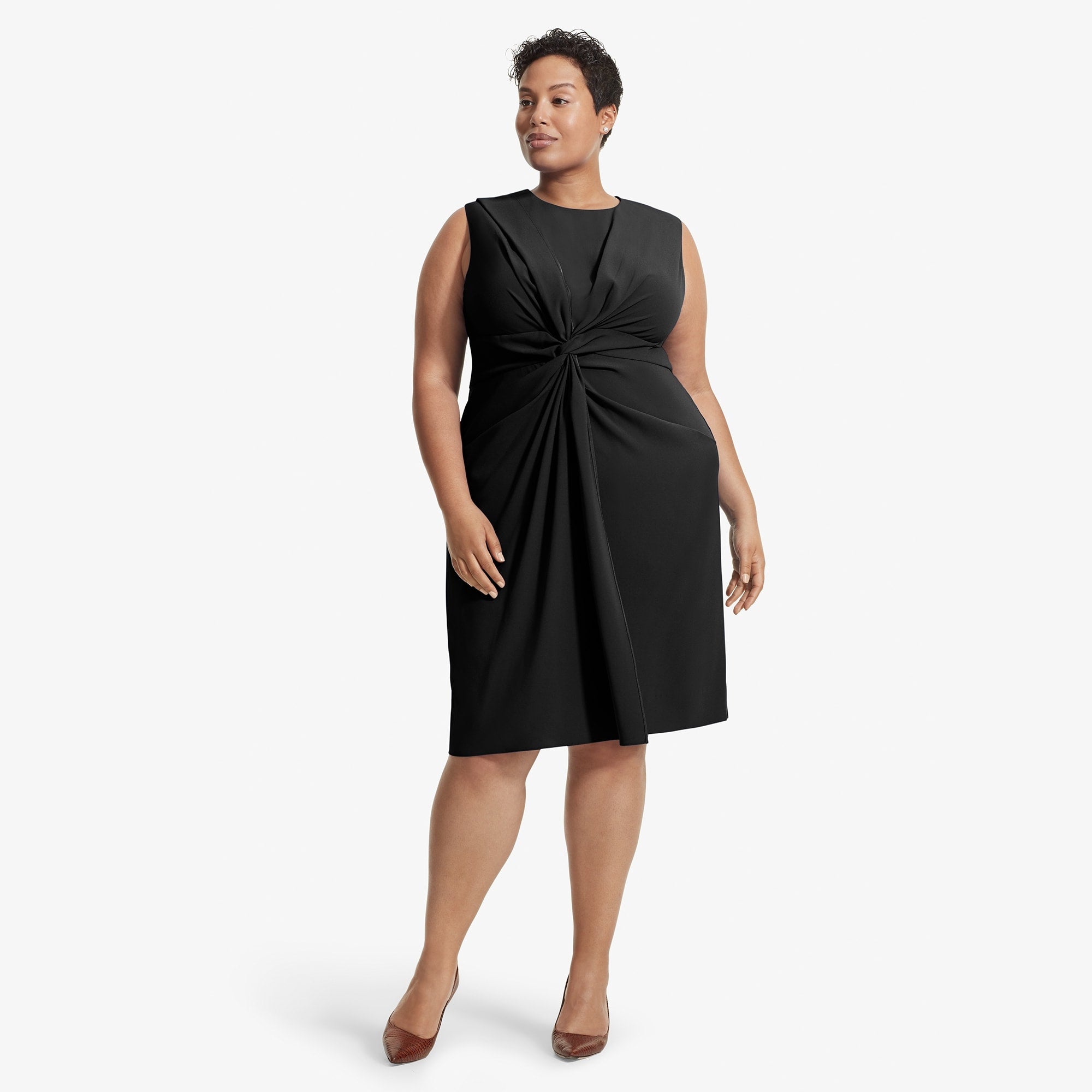 Front image of a woman standing wearing the Taylor dress in Black