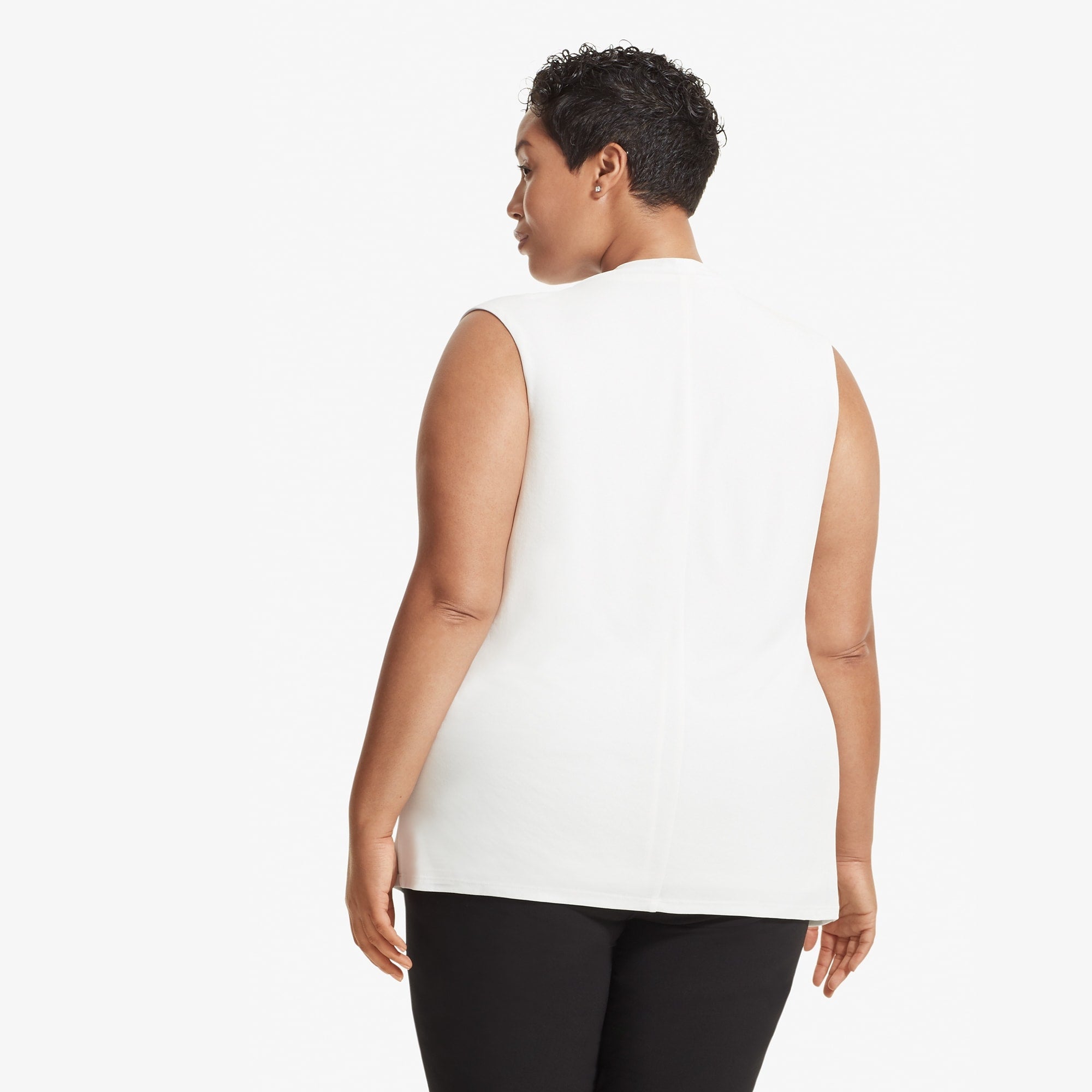 Back image of a woman standing wearing the Walters top knit crepe in Ivory