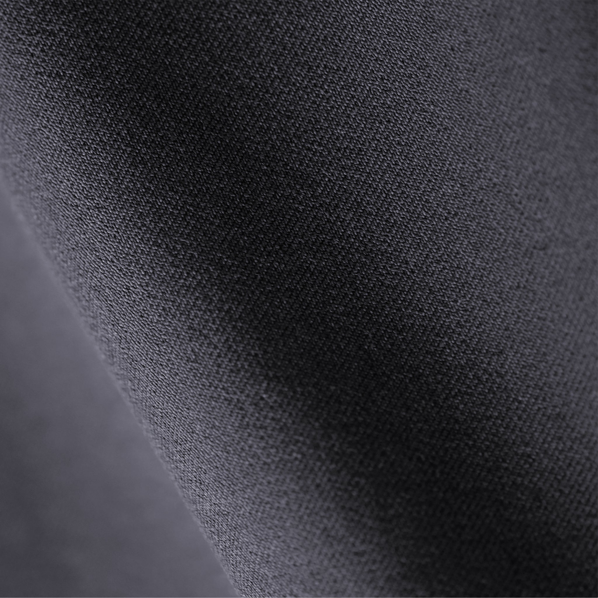 Close up image of better than denim fabric in charcoal