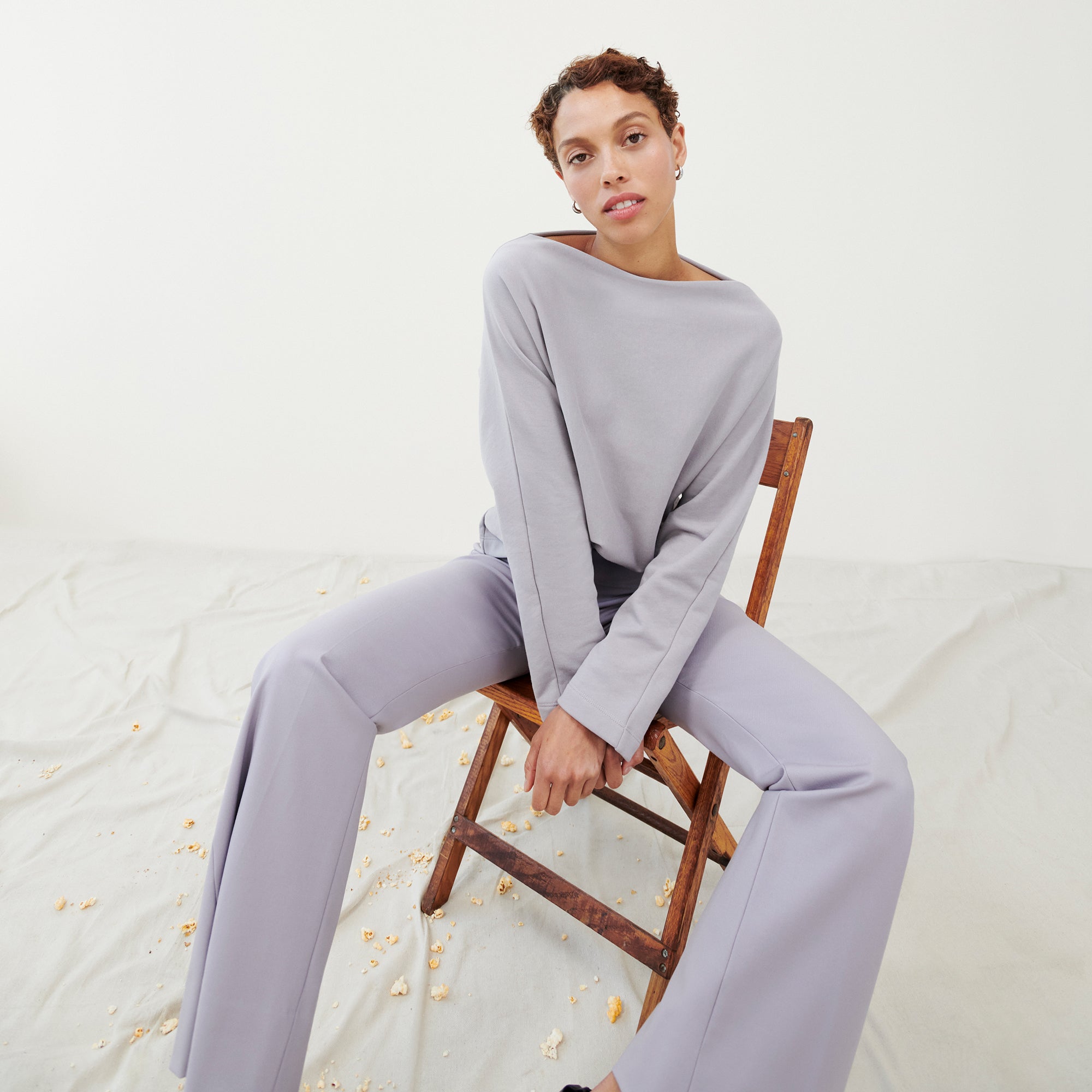 Front image of a woman wearing the Kristin Pullover - French Terry in Wisteria