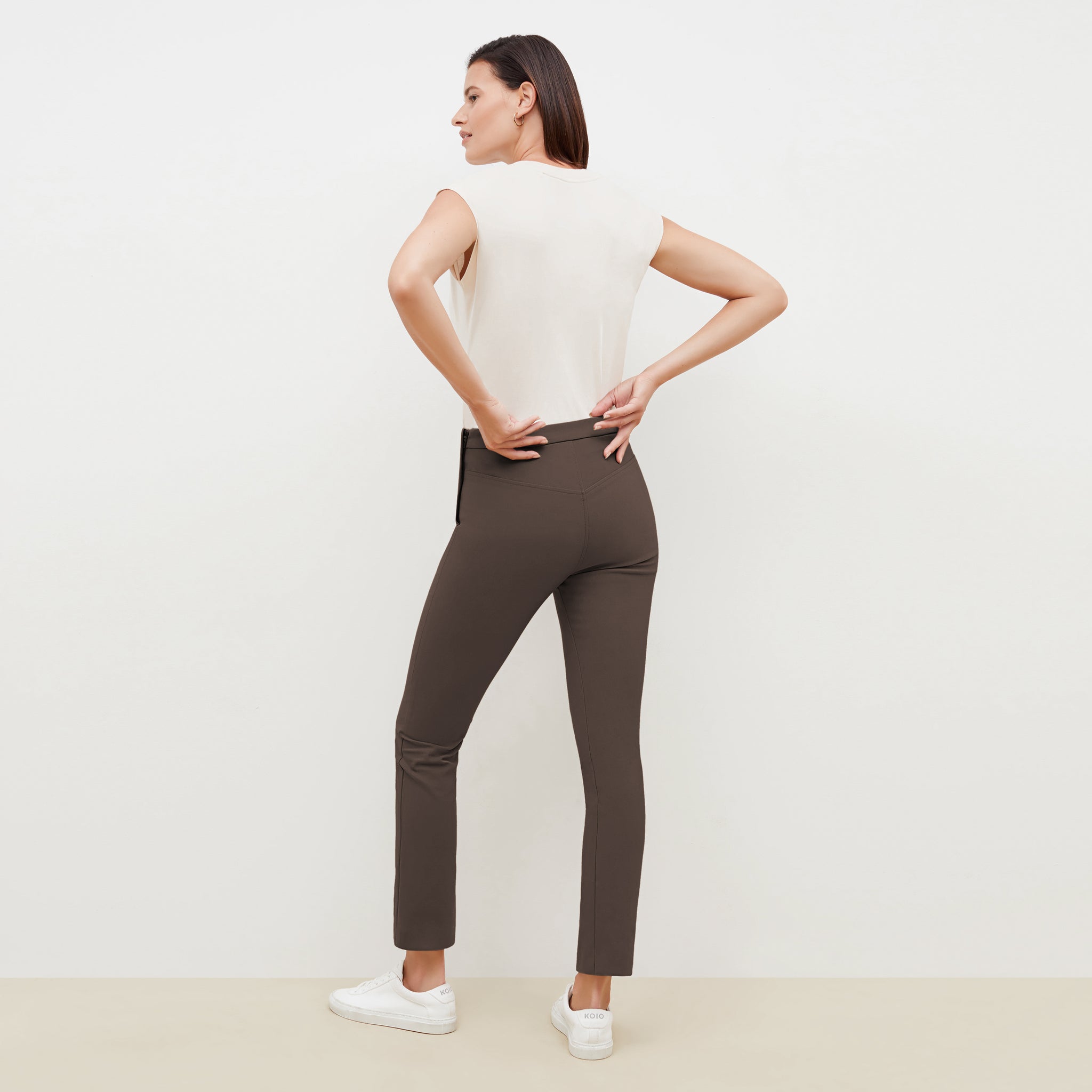 Back image of a woman wearing the Foster Pant in Dark Mink