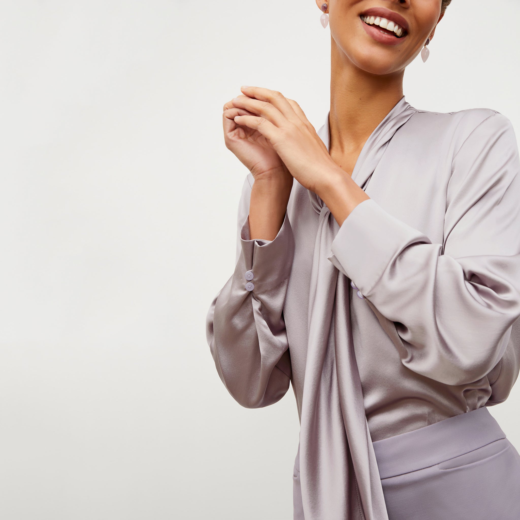 Detail image of a woman wearing the Darcy Top - Washable Silk Charmeuse in Wisteria
