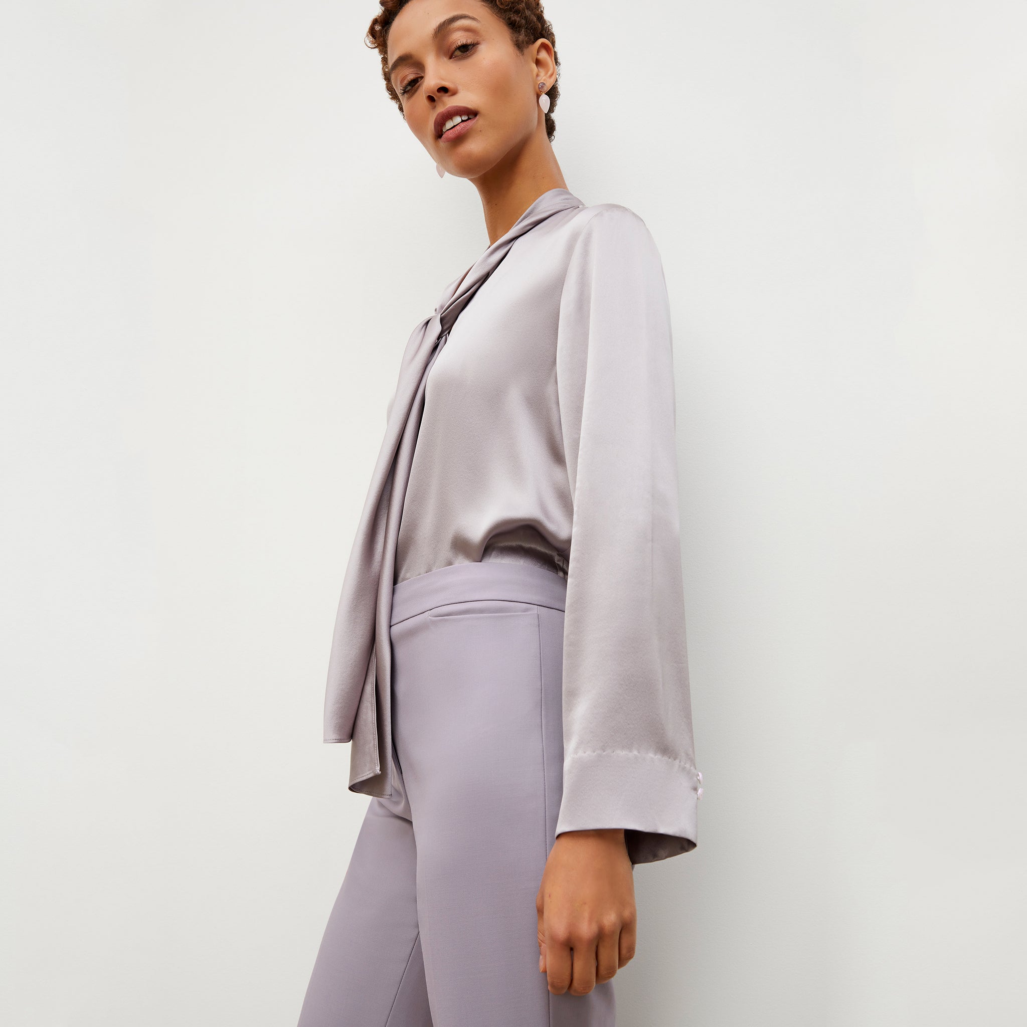 Side image of a woman wearing the Darcy Top - Washable Silk Charmeuse in Wisteria