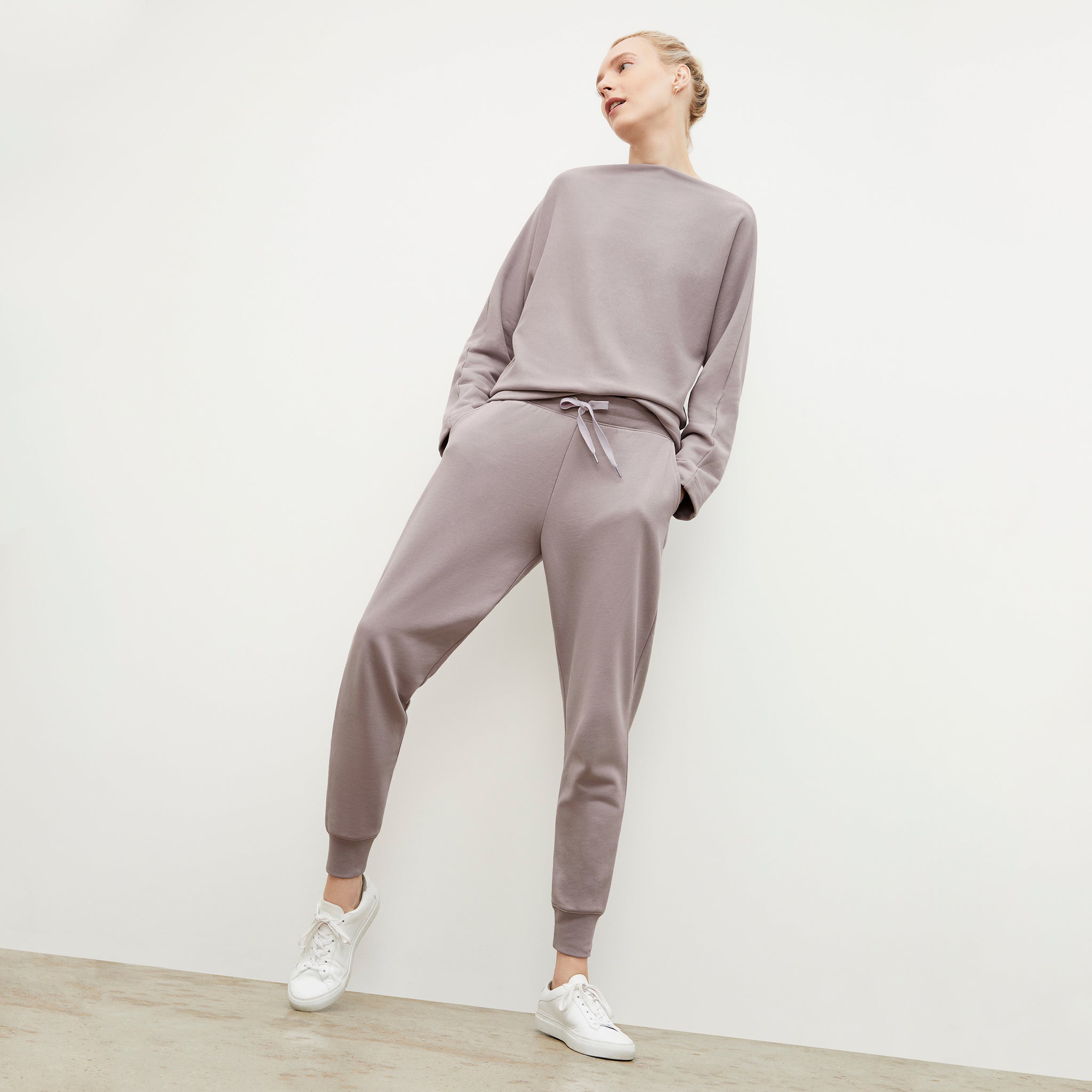 Front image of a woman wearing the Joni Jogger - French Terry in Wisteria