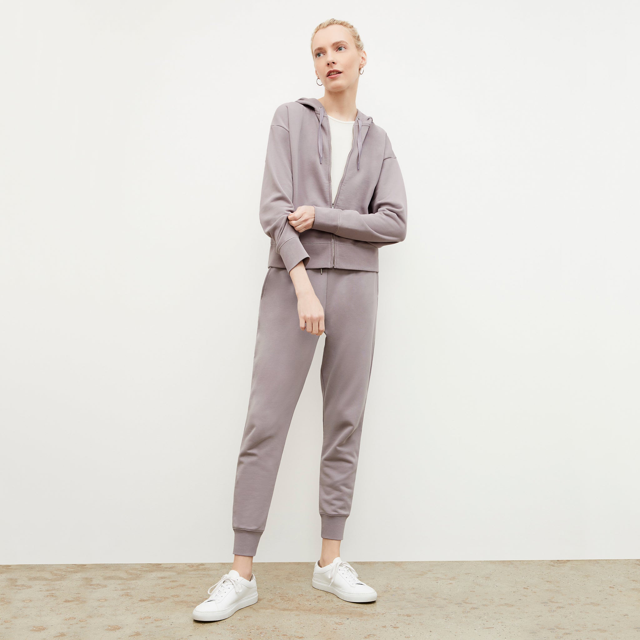 Front image of a woman wearing the Joni Jogger - French Terry in Wisteria