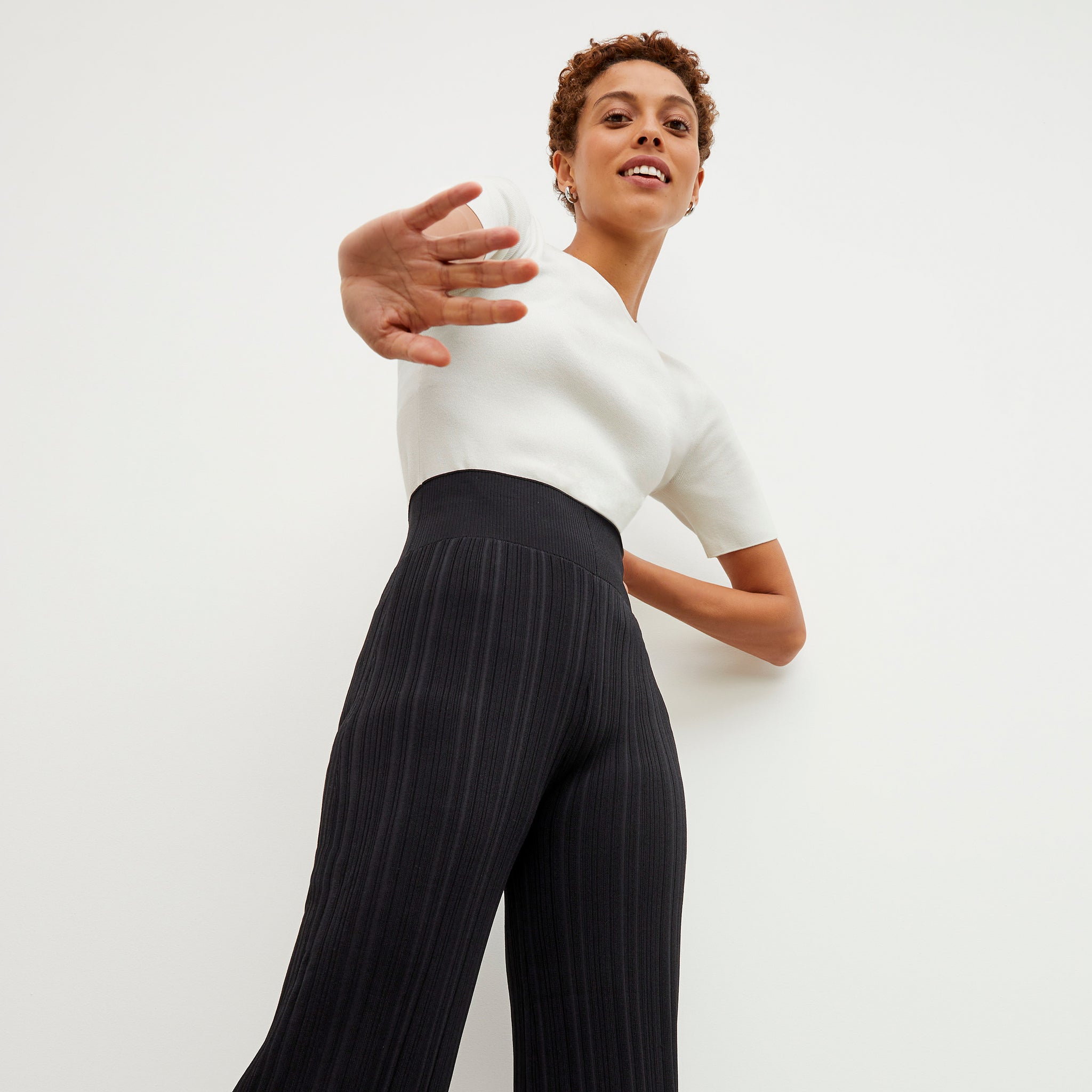 Detail image of a woman wearing the Marijane Pant - Textured Knit in Black