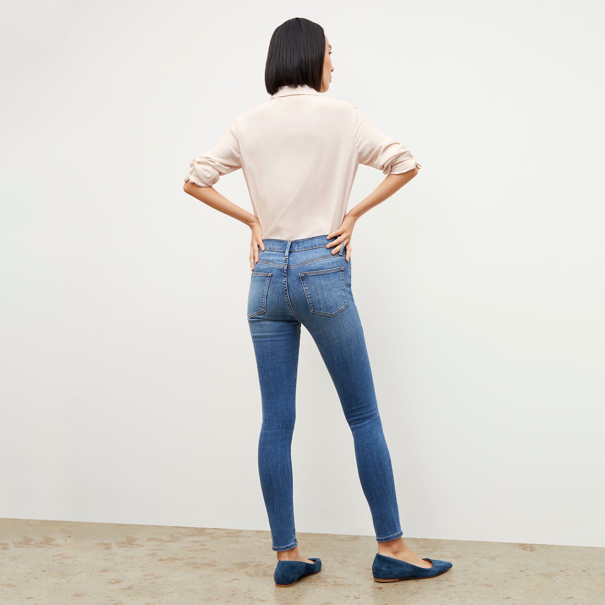 Back image of a woman wearing the FRAME Denim Le High Skinny Jean in Poe