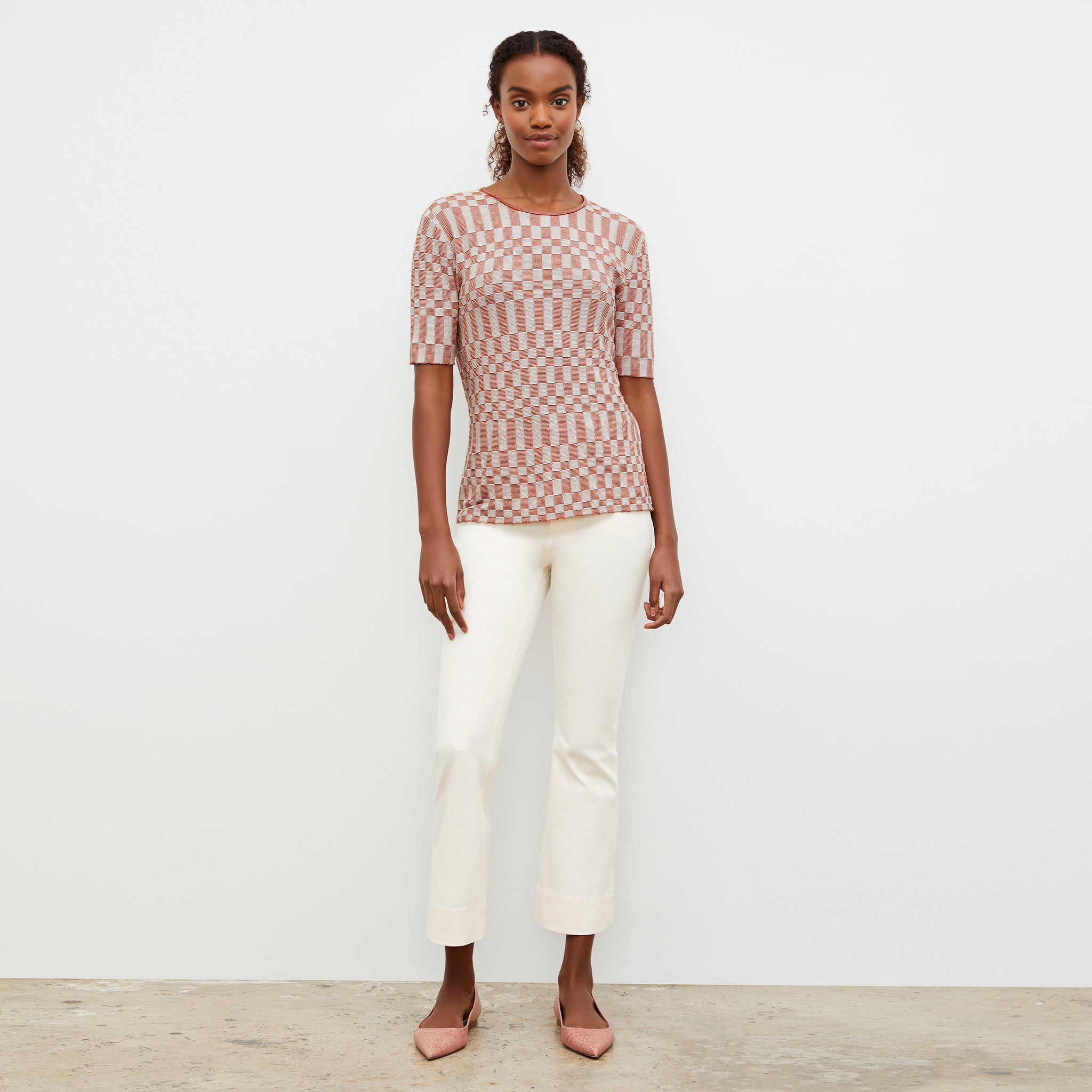 Front image of a woman wearing the Charli Top - Checkered Knit in Red Clay / Natural 