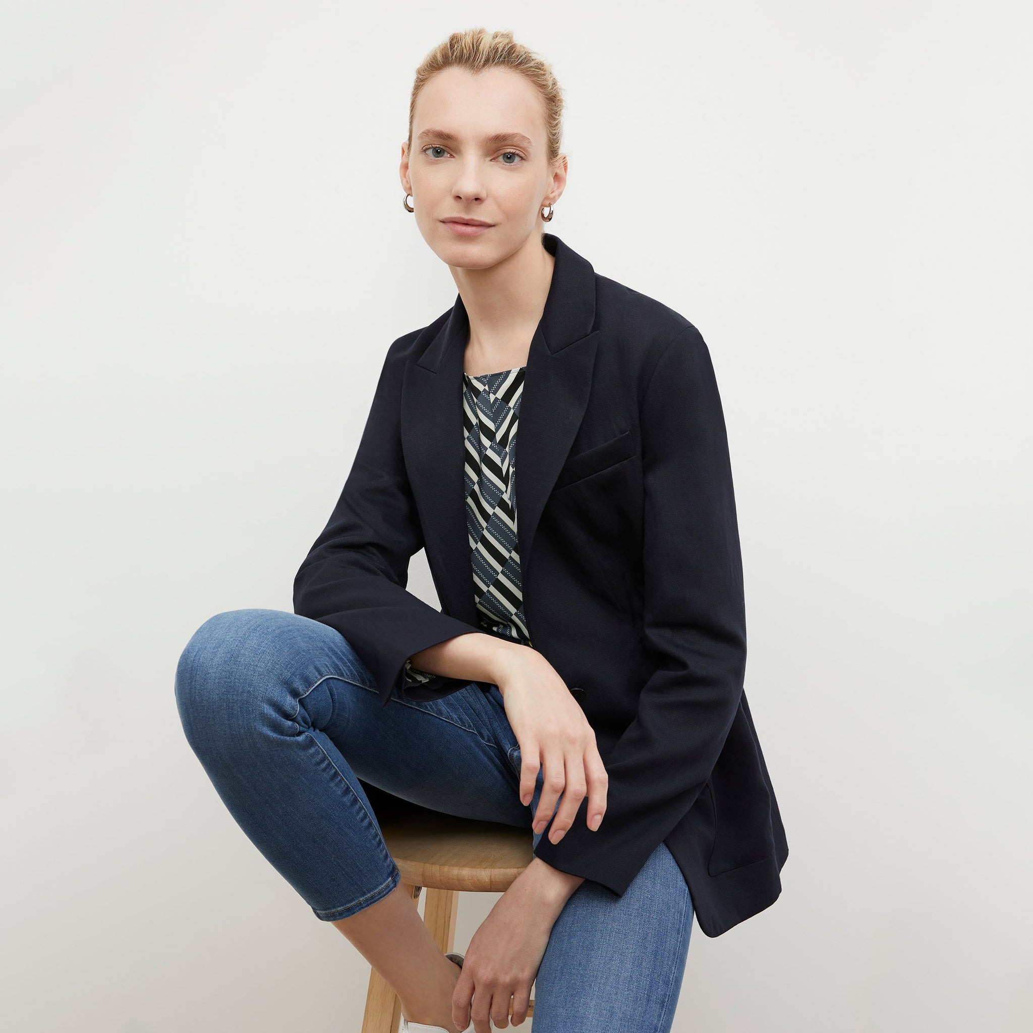 Front image of a woman wearing the Hyo Jacket - Everyday Twill in Night