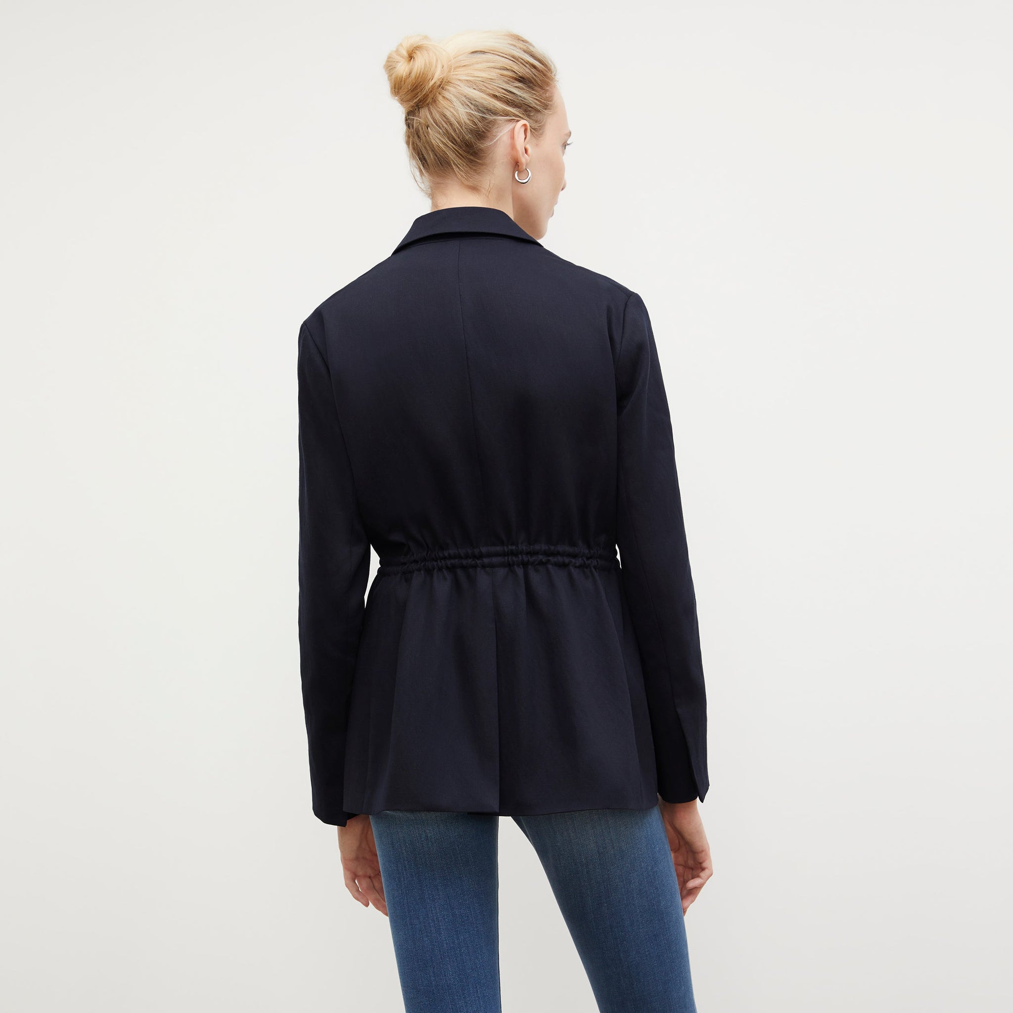 Back image of a woman wearing the Hyo Jacket - Everyday Twill in Night