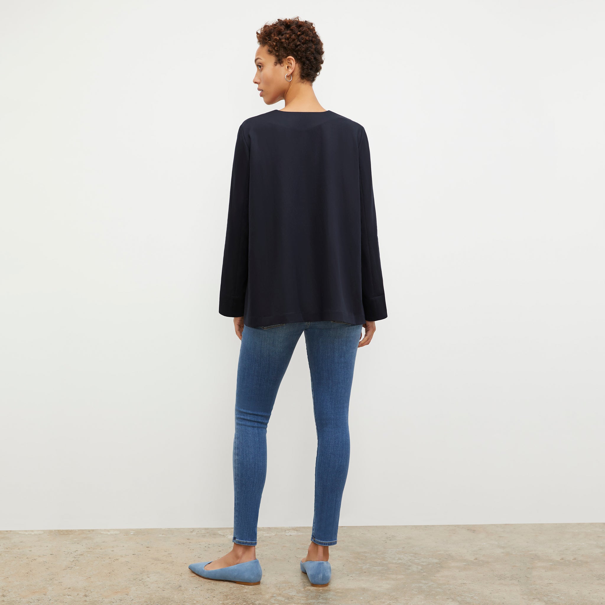 Back image of a woman wearing the Annette Top - Everyday Twill in Night