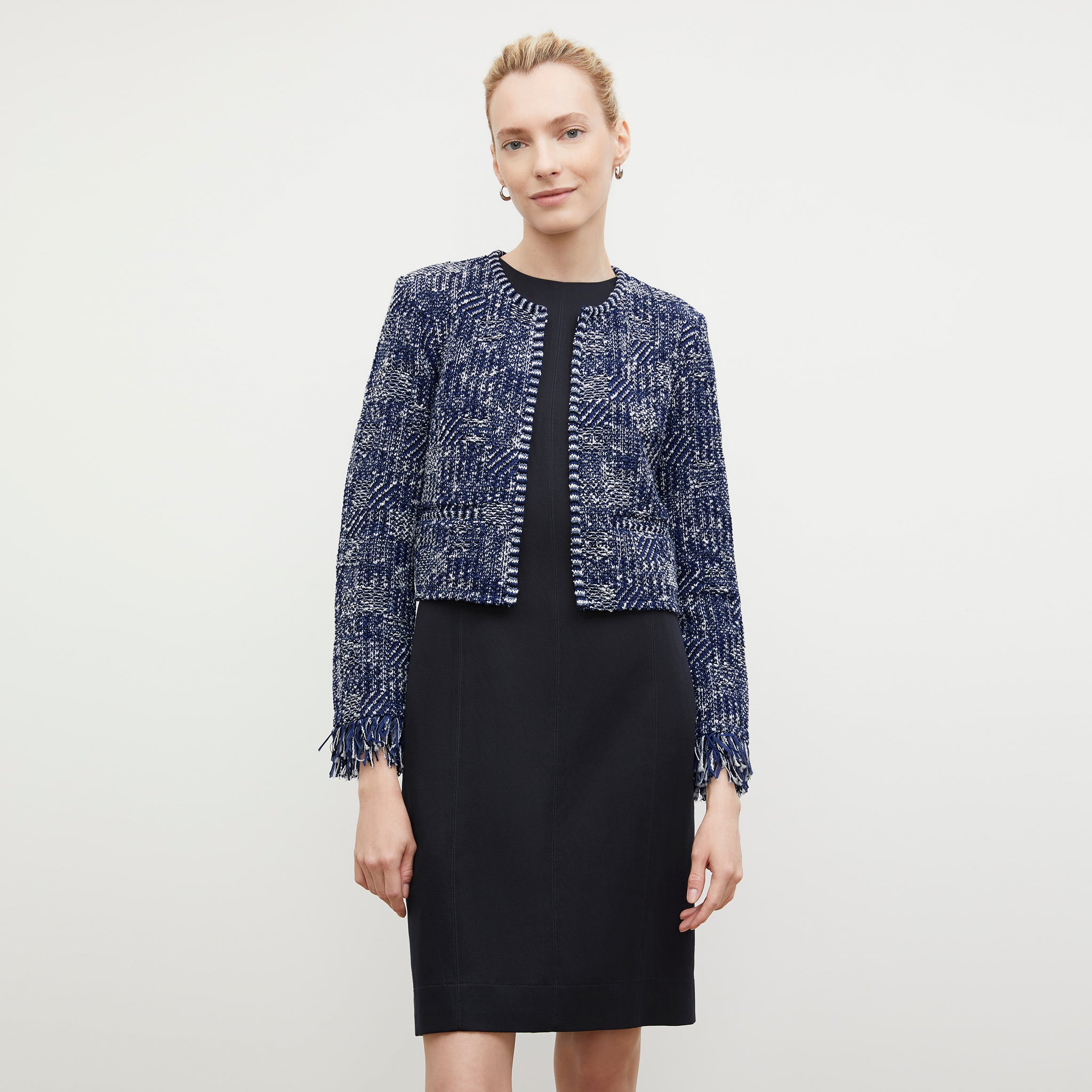 Front image of a woman wearing the Lilia Jacket - Interweave in Navy / Ivory