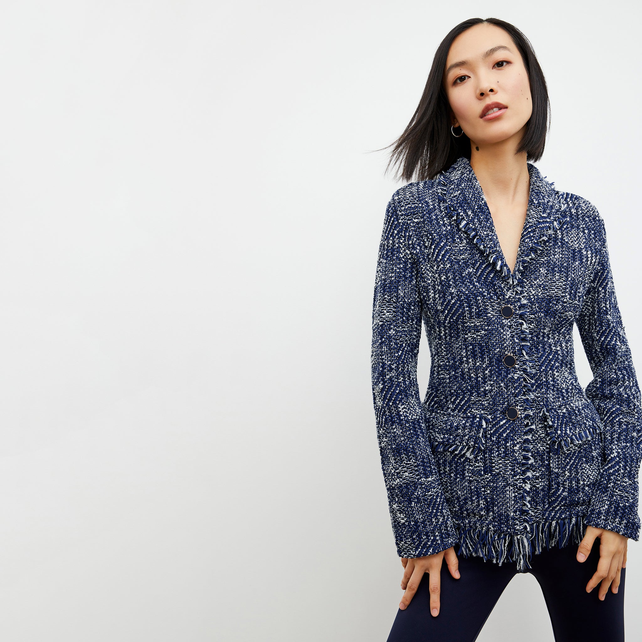 Front image of a woman wearing the Porter Jacket - Interweave in Navy / Ivory 
