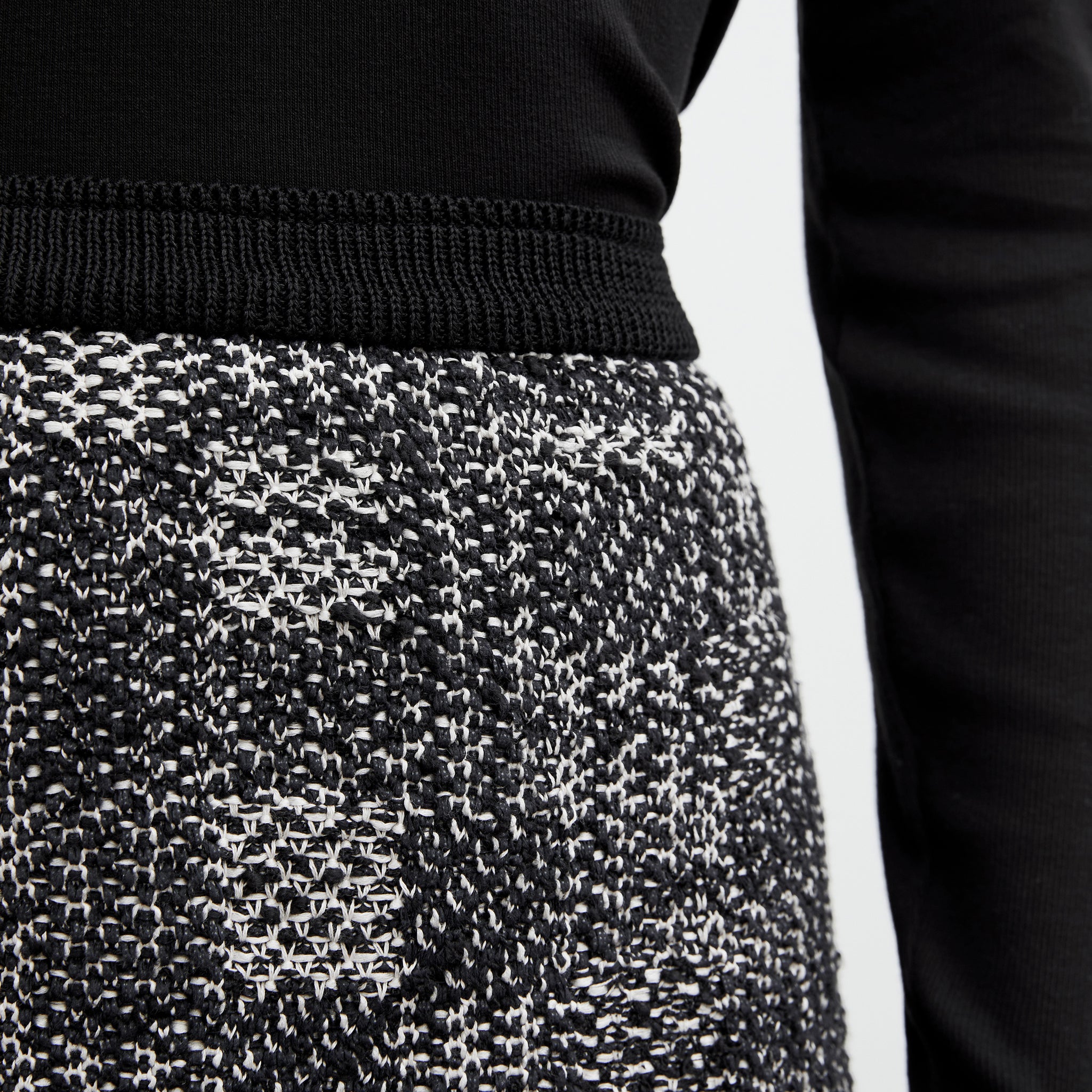Detail image of a woman wearing the Krista Skirt - Interweave in Black / White