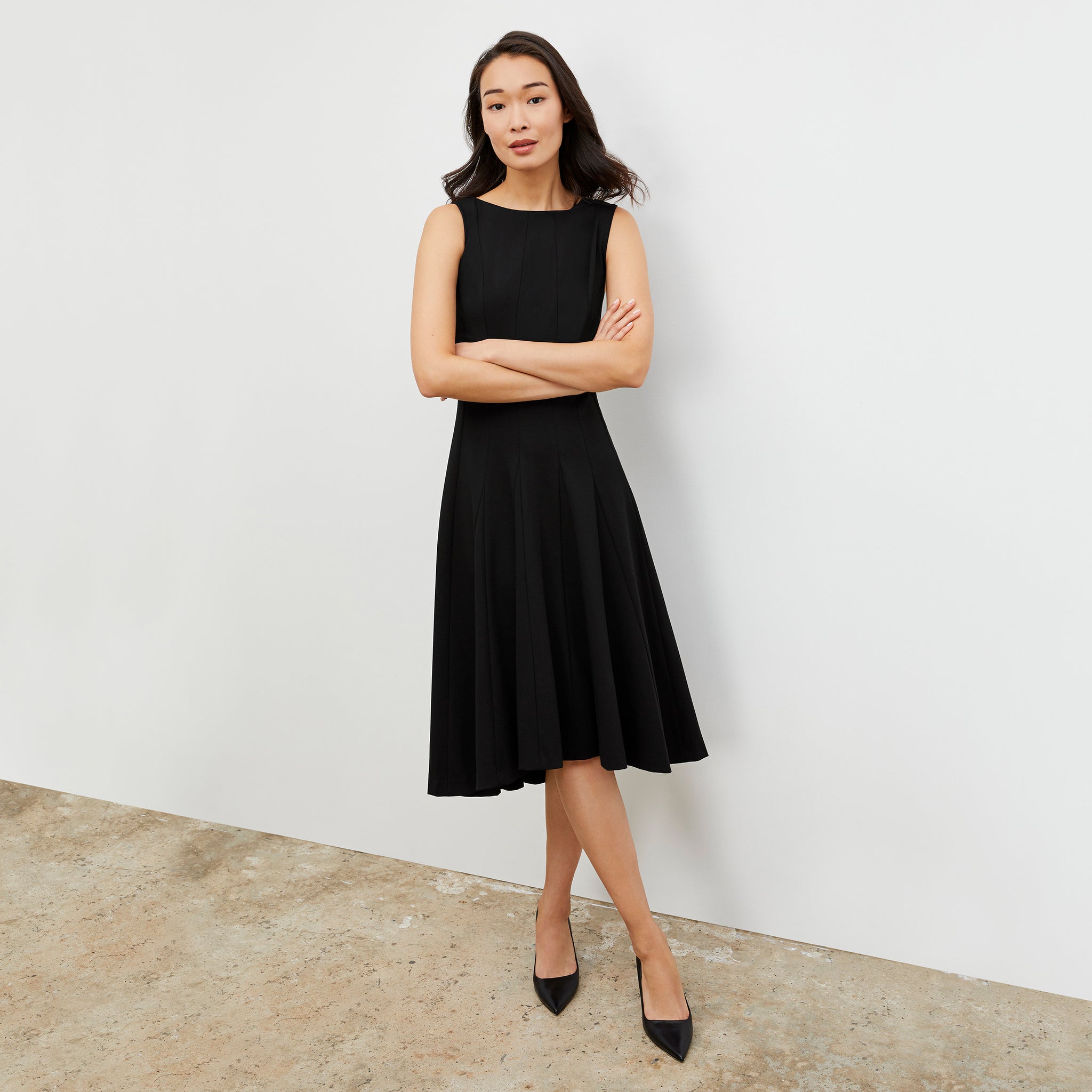 Front image of a woman wearing the Gabriella Dress in Black 