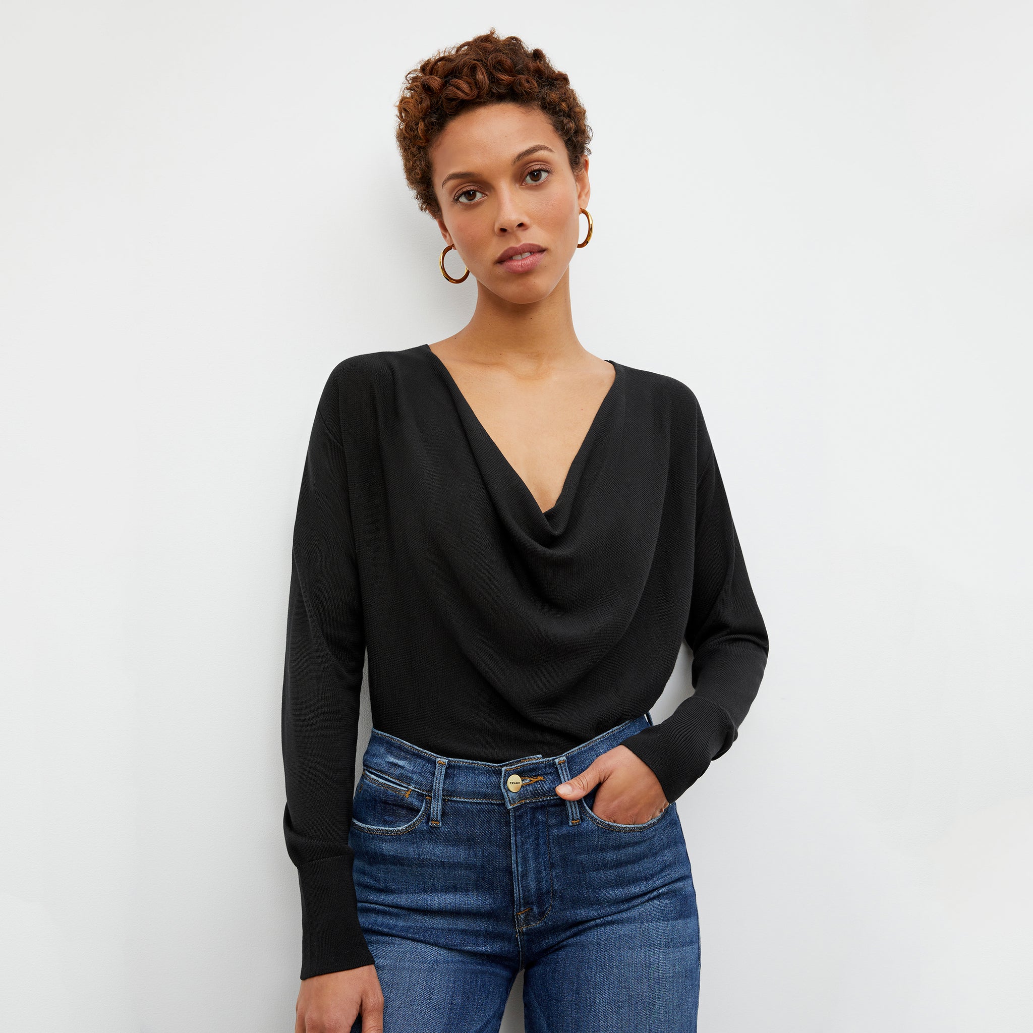 Front image of a woman wearing the Monica Top in Black