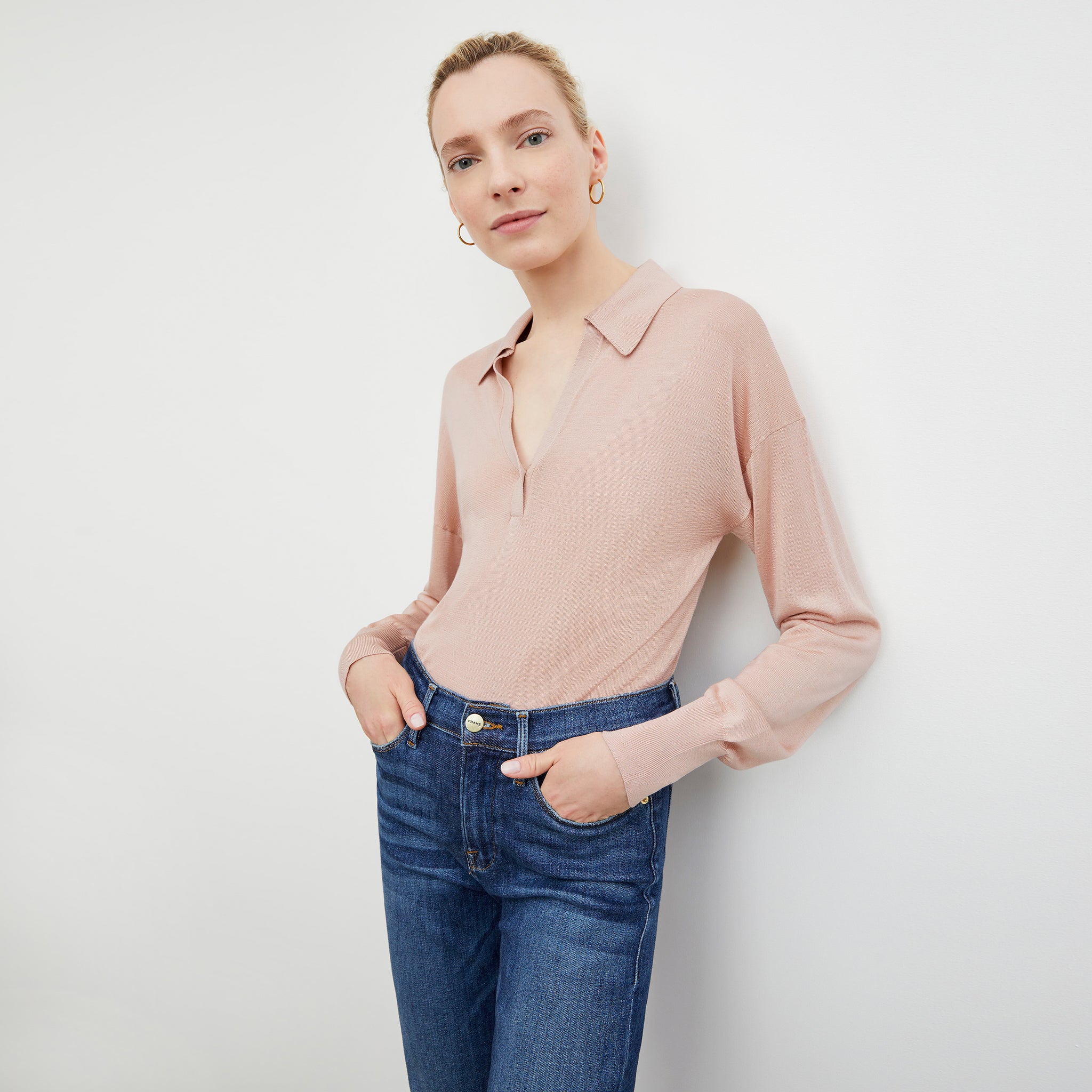 Front image of a woman wearing the Leo Top in Pink Salt 